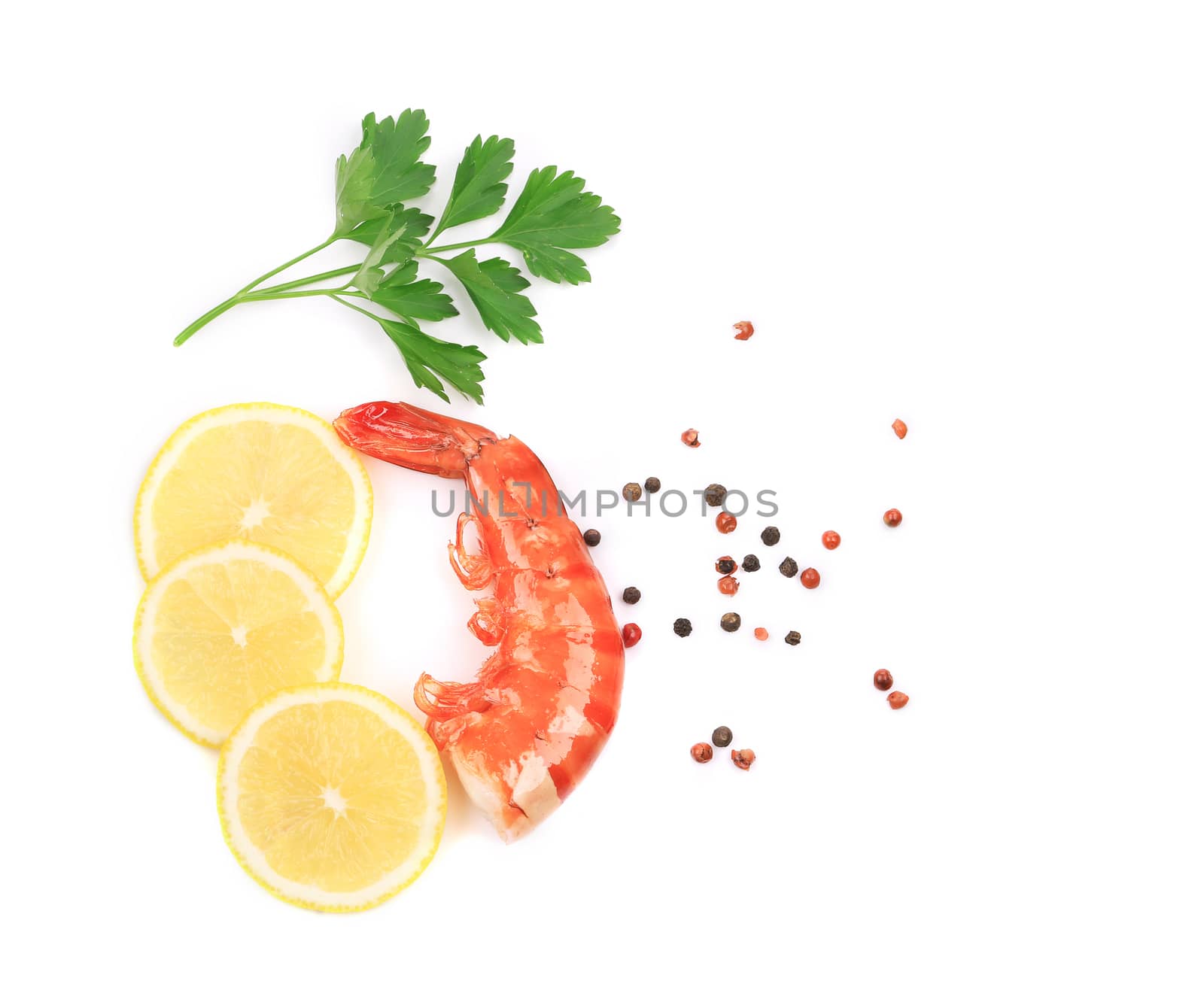 Shrimp with lemon and parsley. Isolated on a white background.