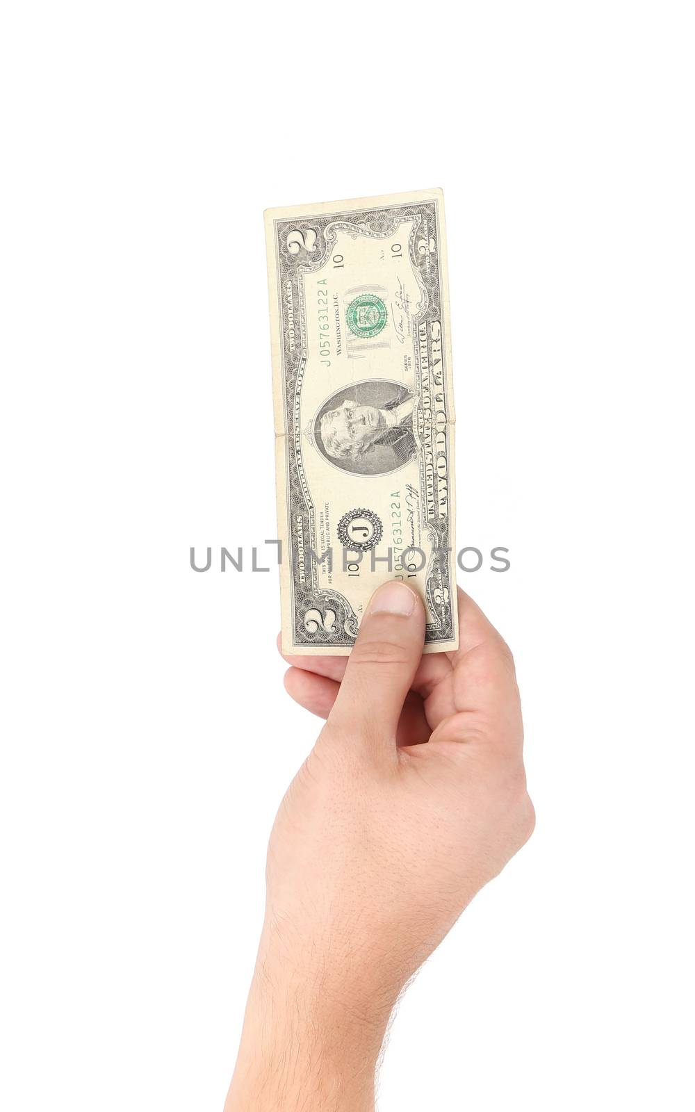 Hand holding two dollar bill. Isolated on a white background.