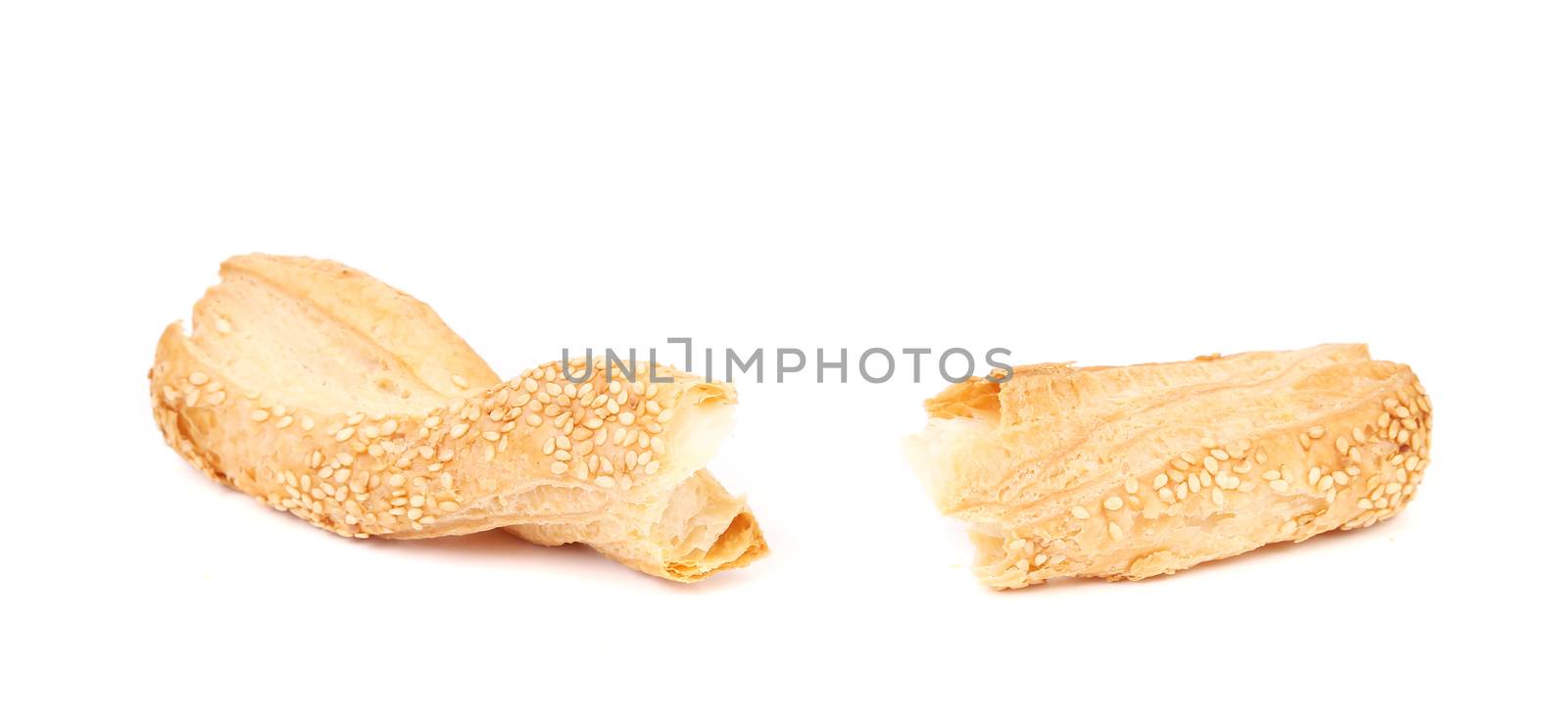 Cheese cracker with sesame. Isolated on a white background.
