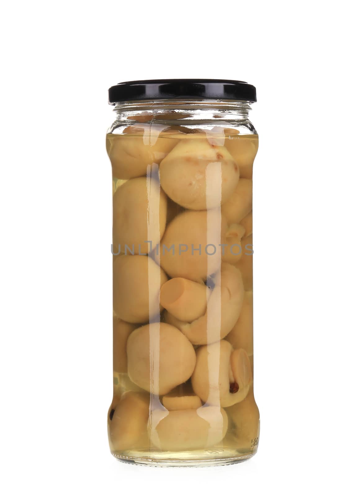 Marinated champignon mushrooms in glass jar. Isolated on a white background.