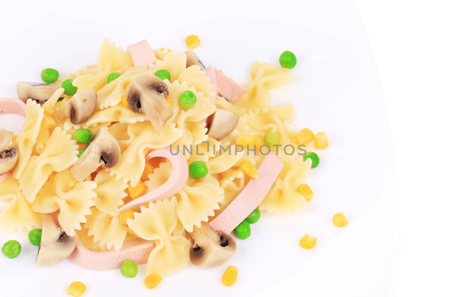 Pasta with ham and mushrooms. Whole background.