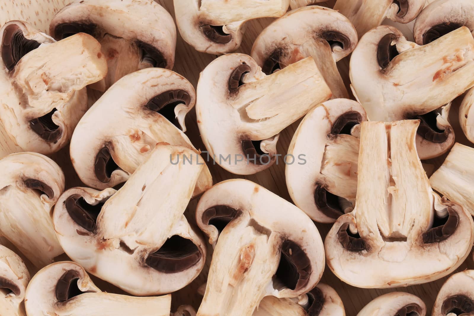 Bunch of white mushrooms close up. Whole background.