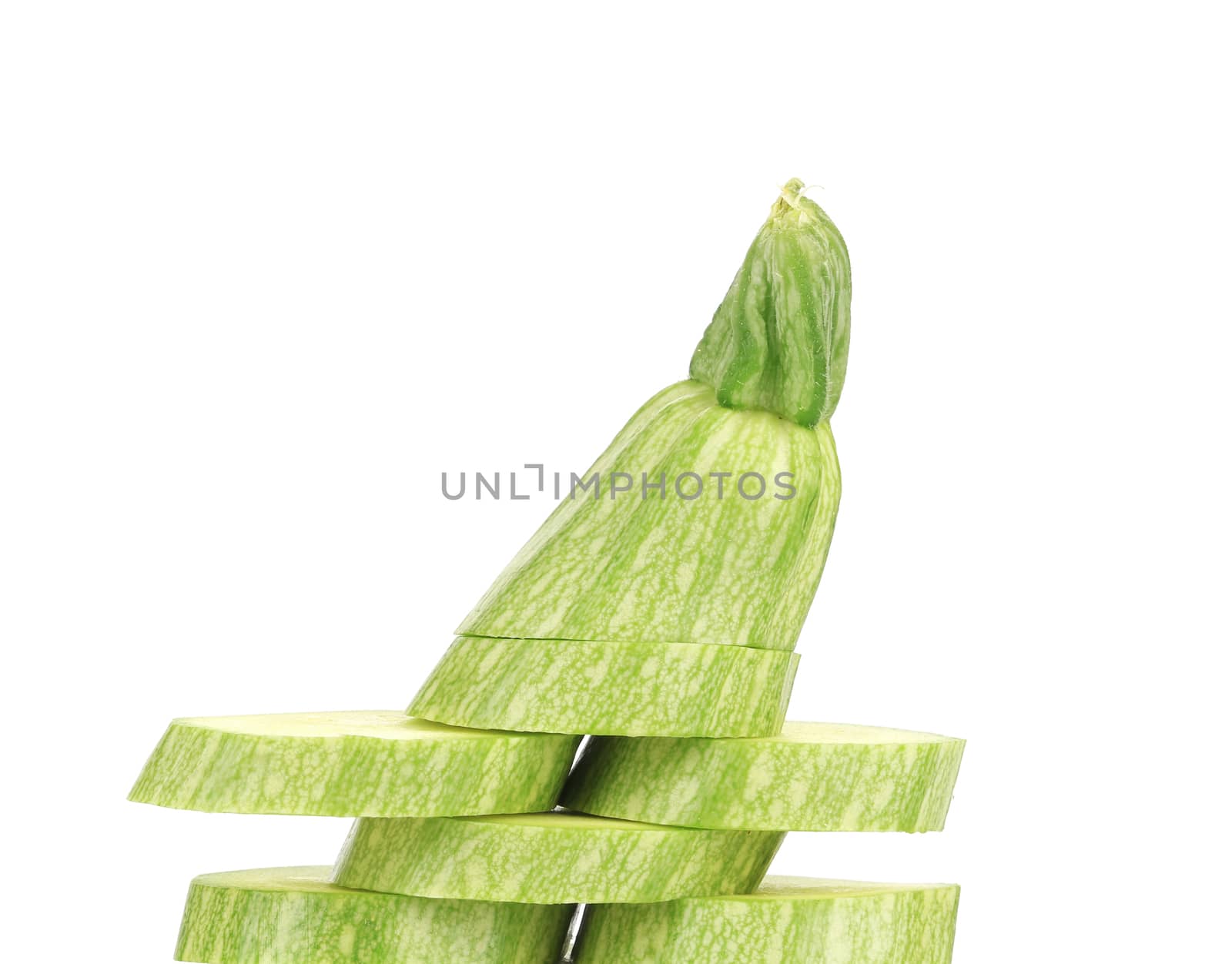 Fresh zucchini closeup. Isolated on a white background.