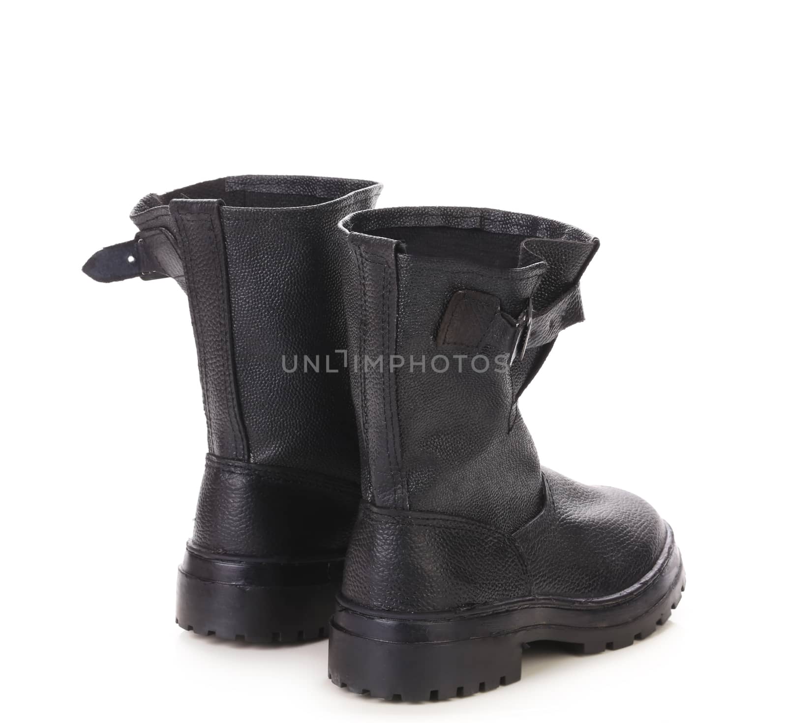 Black high leather boots. Isolated on a white background.