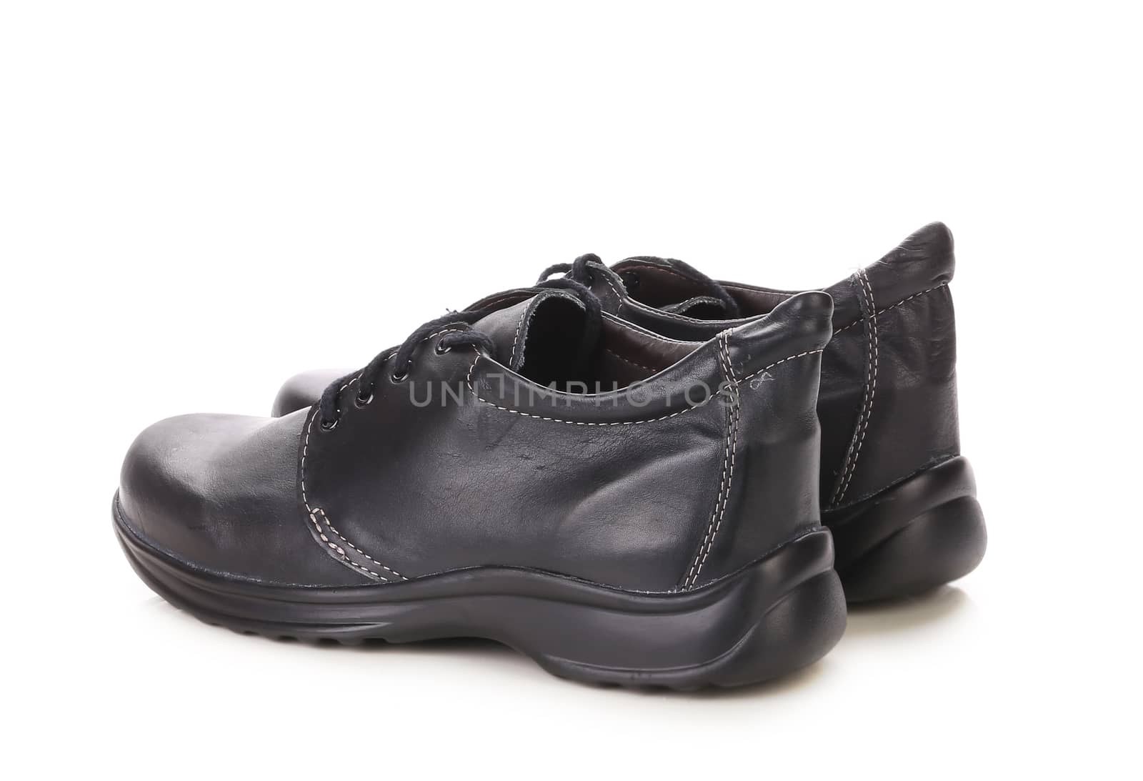 Pair of leather boots. Isolated on a white background.