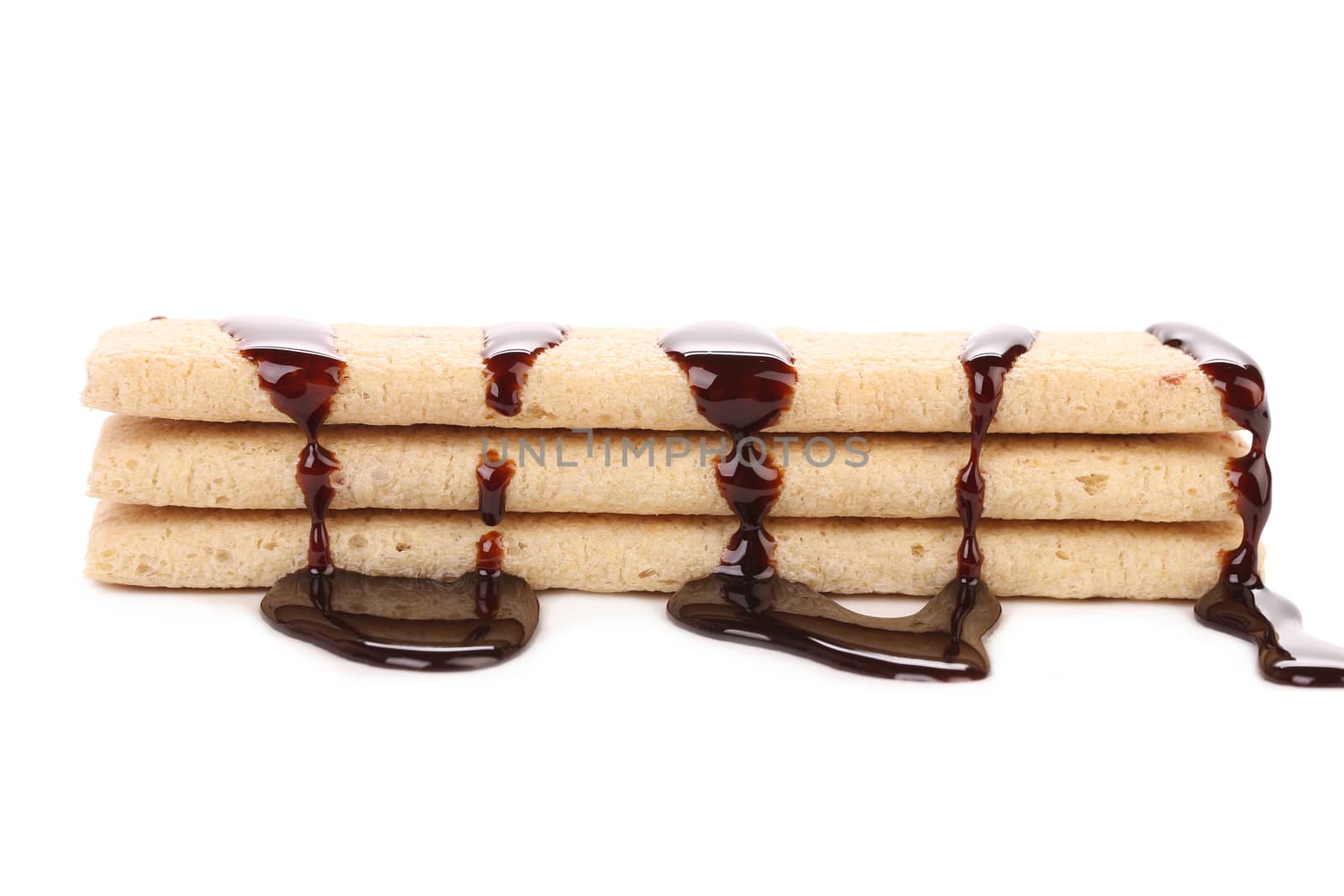 Coated cookies of chocolate. Isolated on a white background.