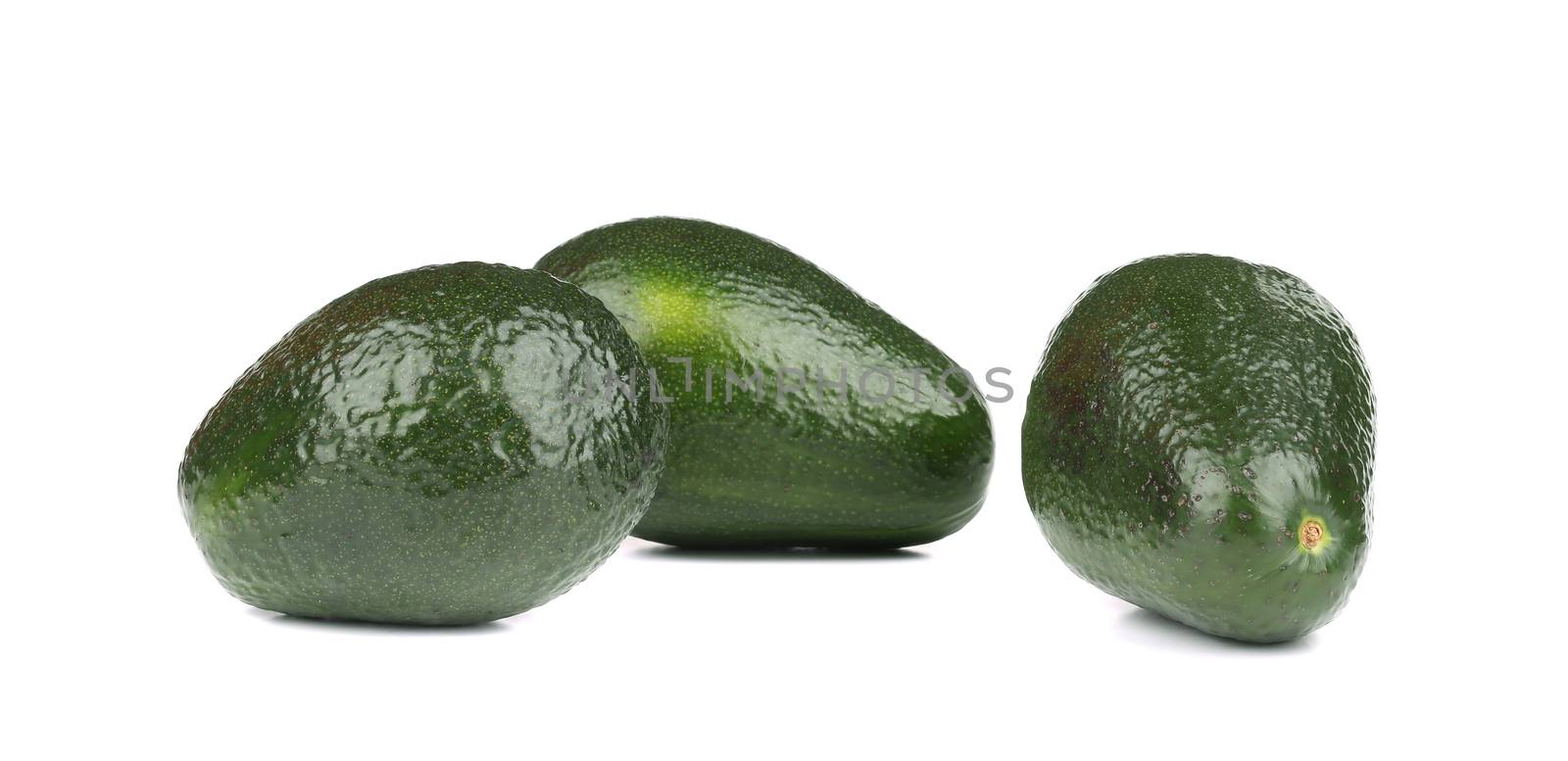 Three avocados. Isolated on a white background.