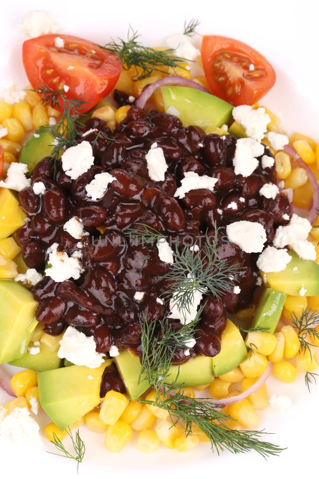 Red beans salad with feta cheese. Isolated on a white background.