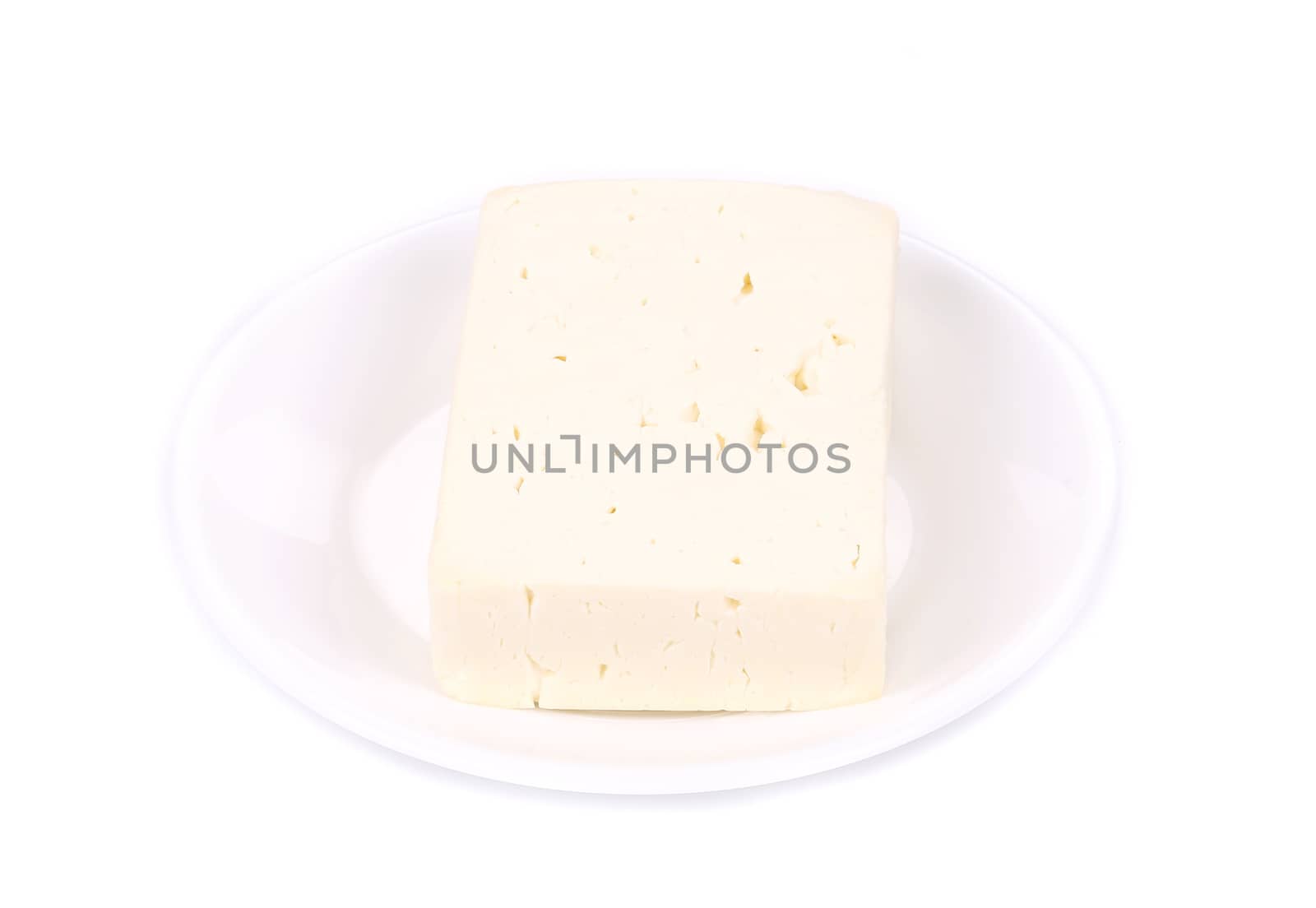 Delicious feta cheese. Isolated on a white background.