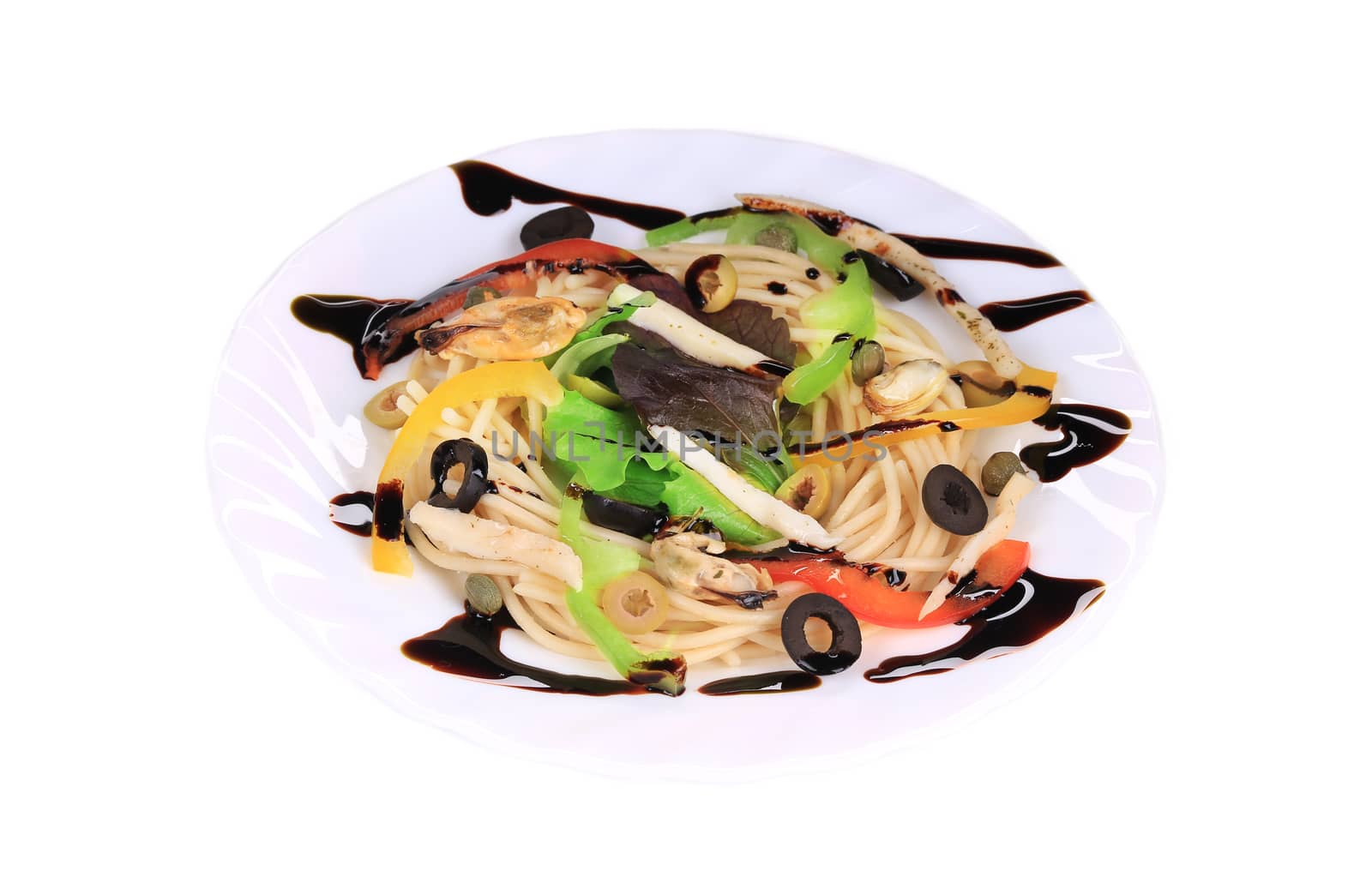 Seafood salad with spaghetti. Isolated on a white background.