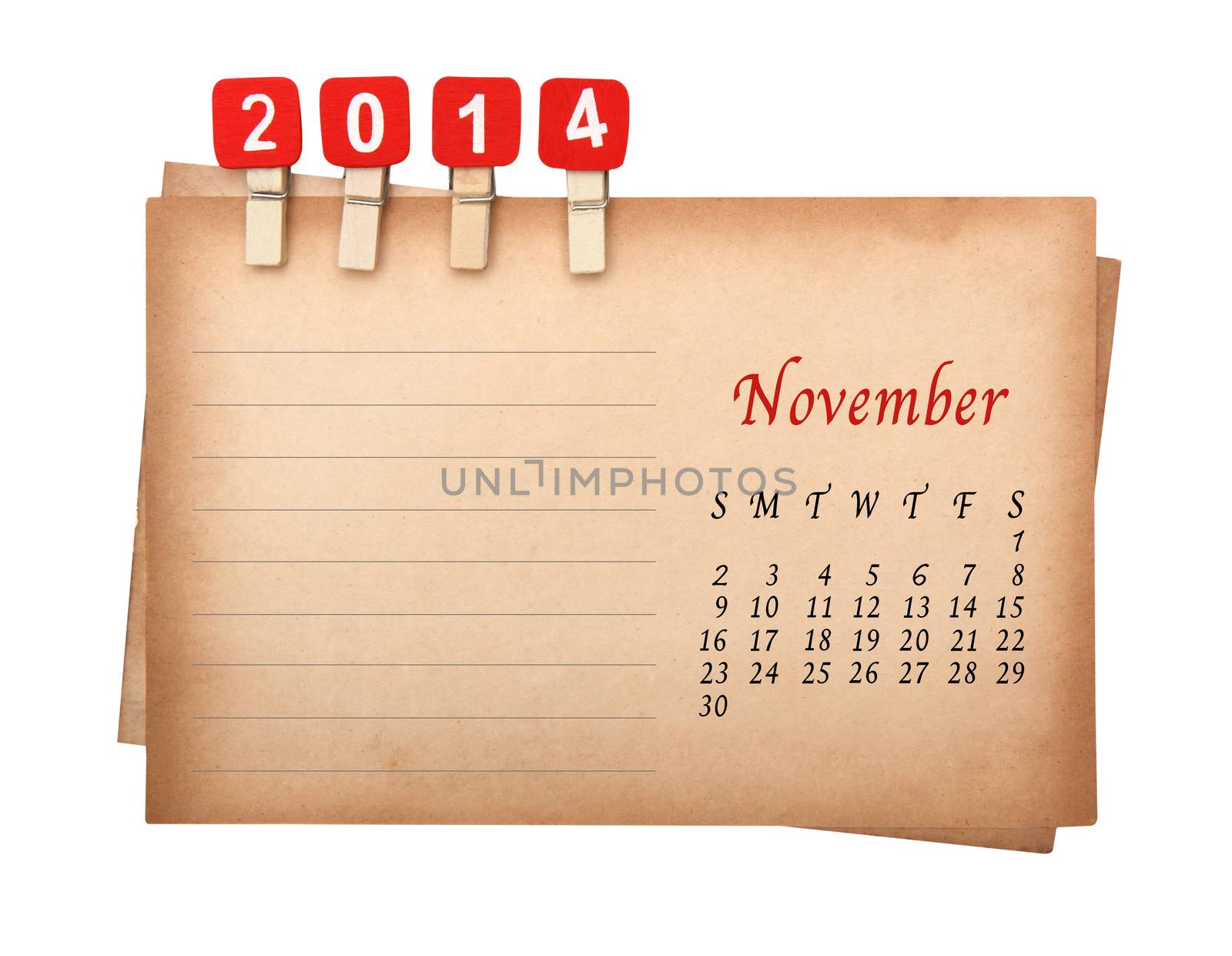 Calendar 2014 on the old paper with wooden pegs