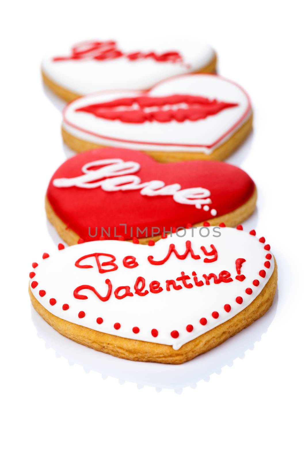 Valentine love cookies in shape of heart on white background for Valentine's Day