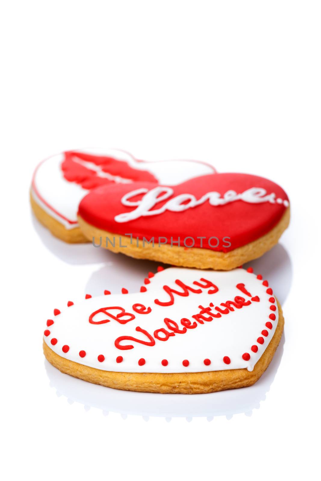 Cookies in shape of heart on white background for Valentine's Day