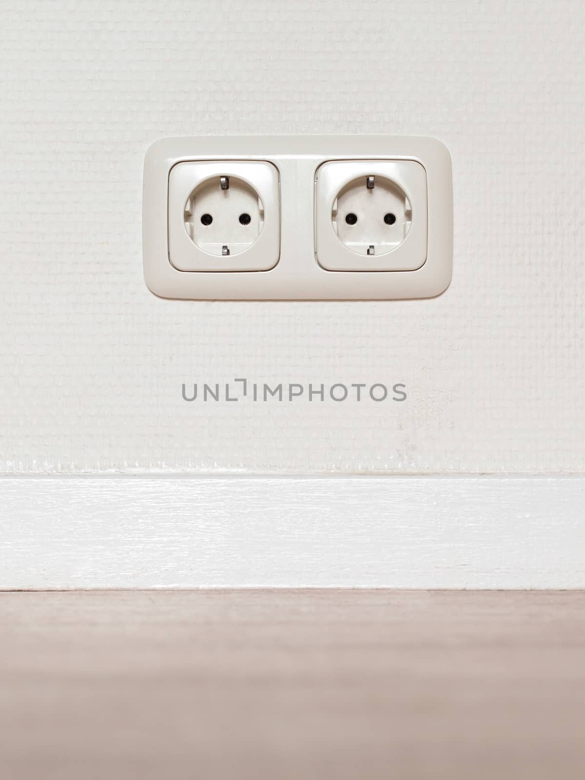 Electrical jack white plastic socket  by michaklootwijk