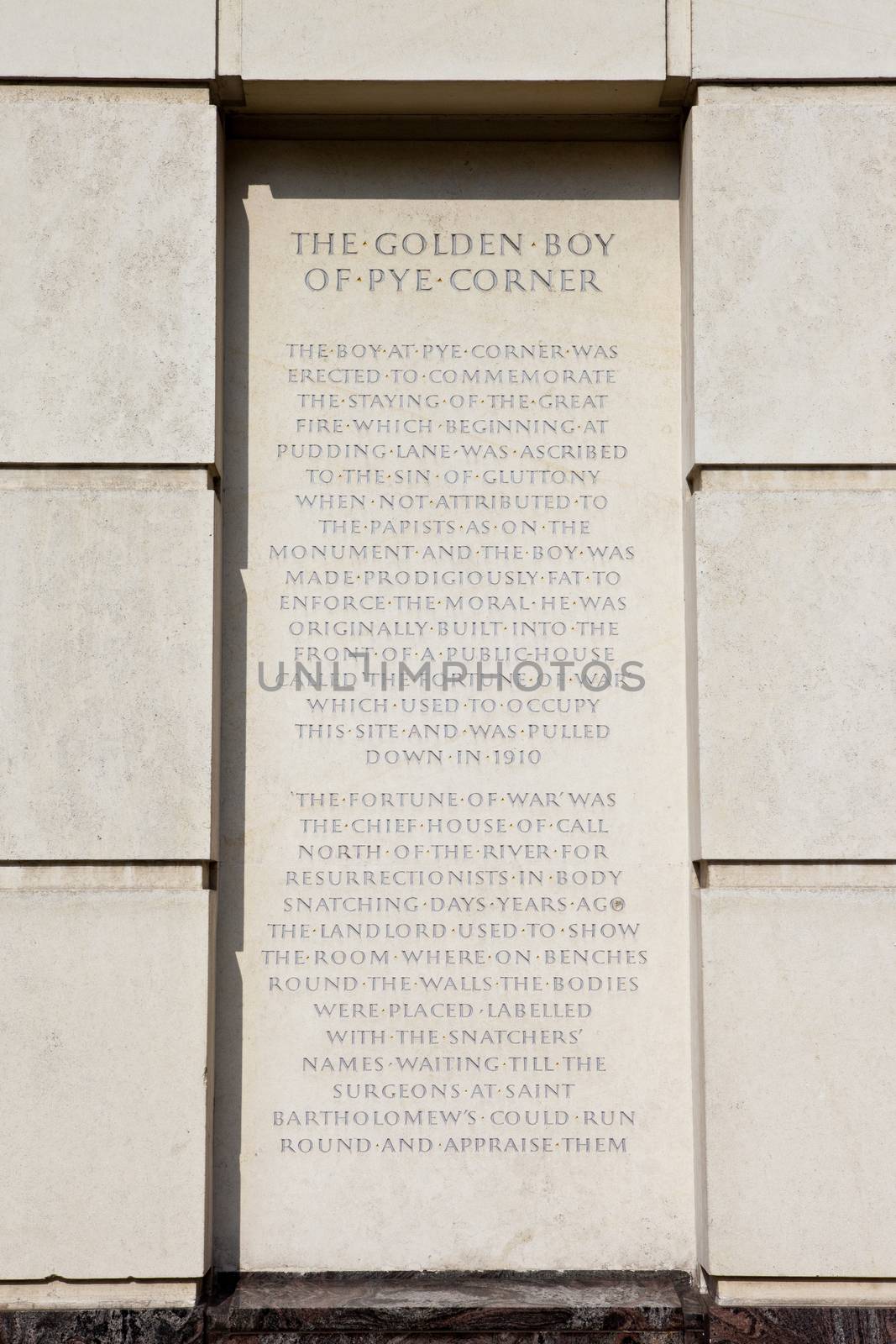 The Plaque of the Golden Boy of Pye Corner in the City of London.  The plaque marks the location where the Great Fire of London was stopped in 1666.