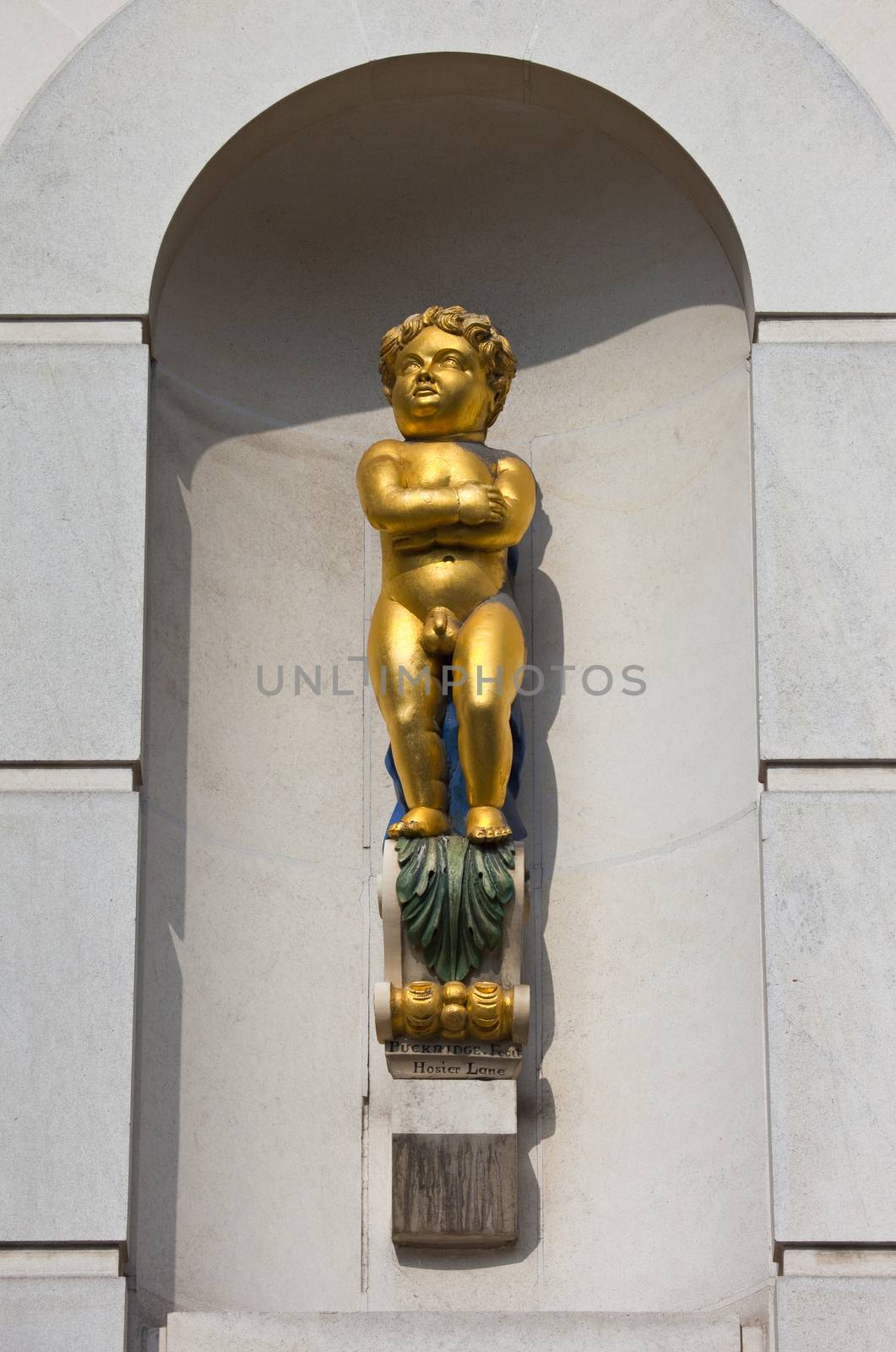The Golden Boy of Pye Corner in the City of London.  The statue marks the location where the Great Fire of London was stopped in 1666.