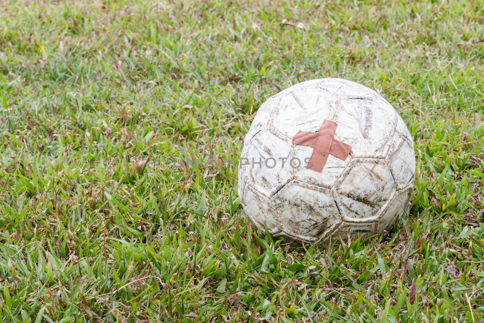 old football with patched on field