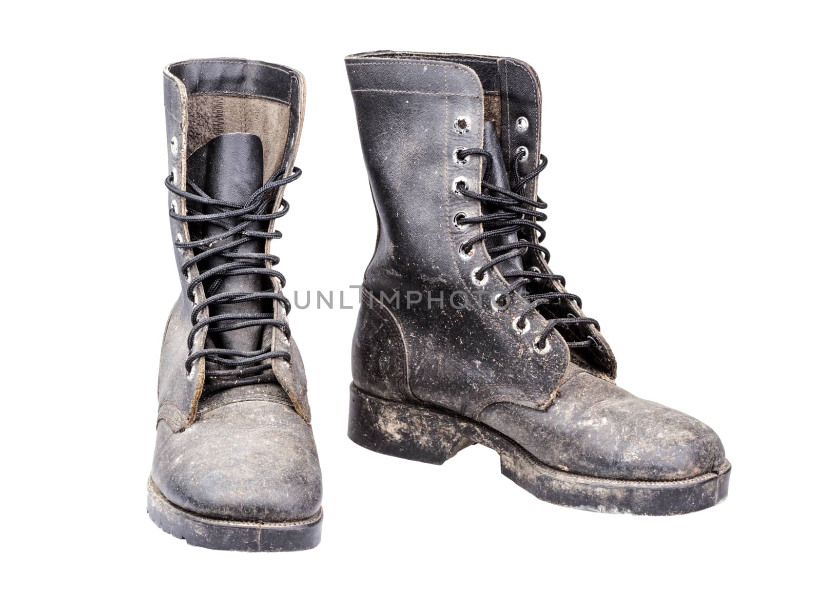 dirty combat boots isolated on white