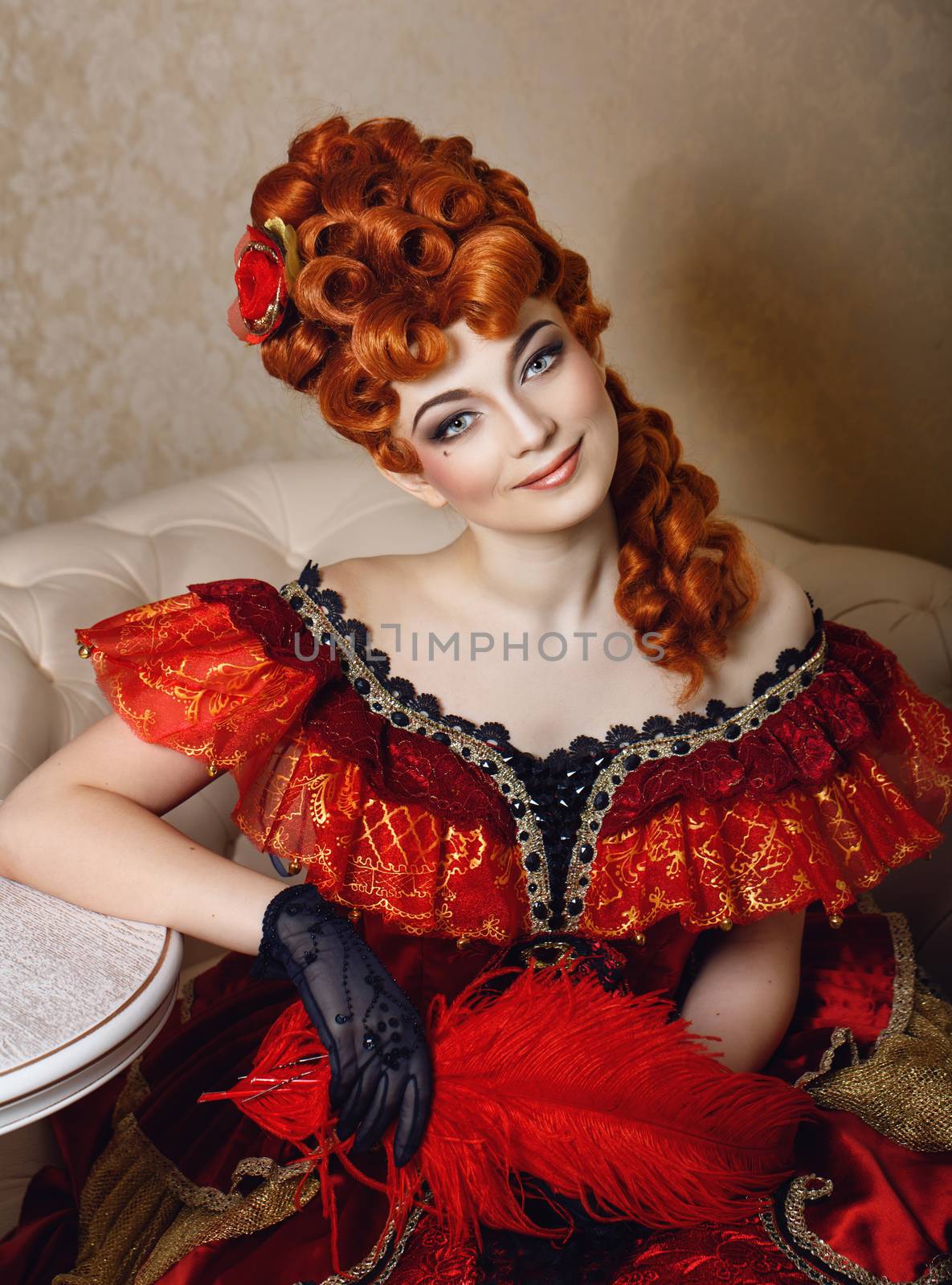 Attractive girl red dress and red wig courtesan