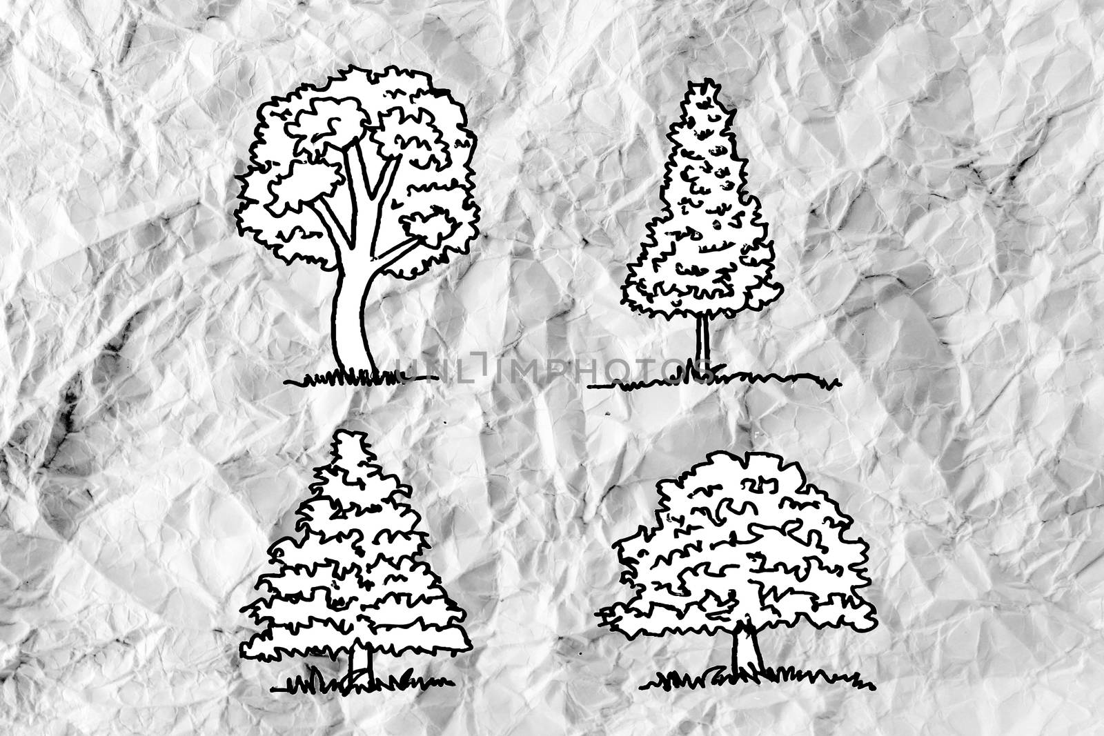 Set of trees with leaves on crumpled paper