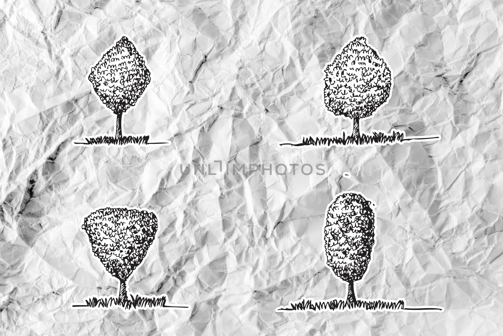 Set of trees with leaves on crumpled paper