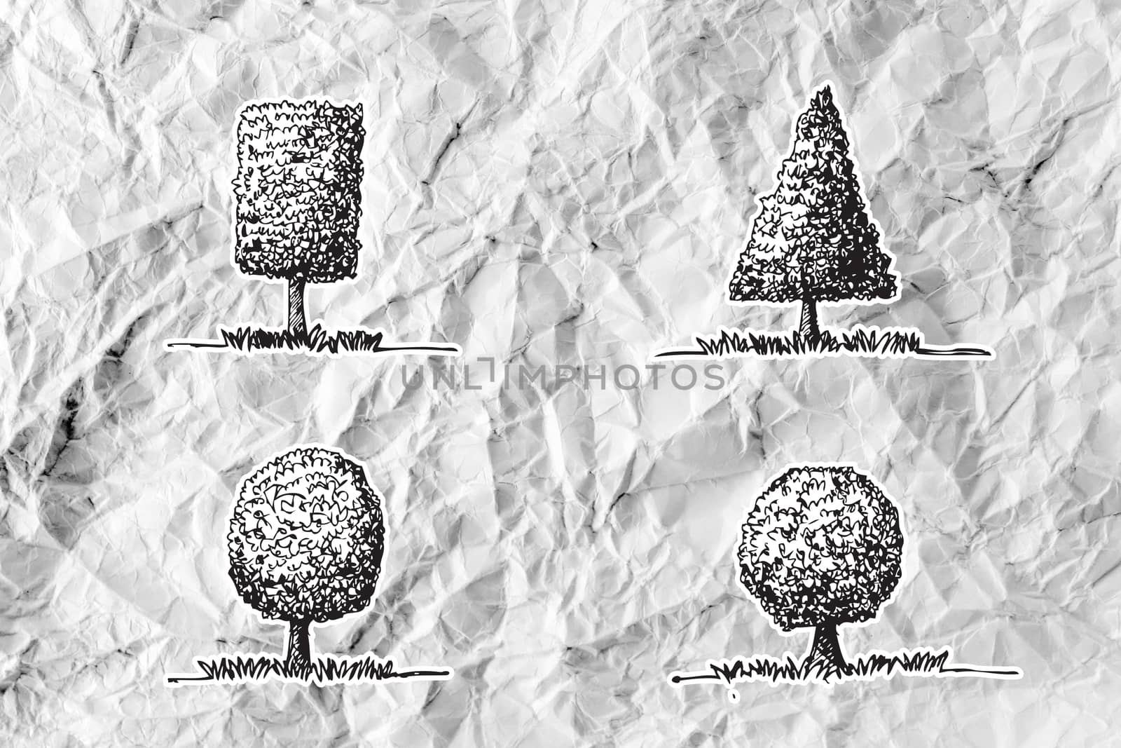 Set of trees with leaves on crumpled paper