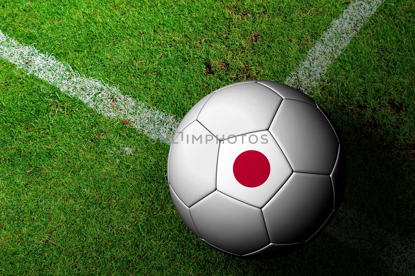 Japan Flag Pattern of a soccer ball in green grass by jakgree