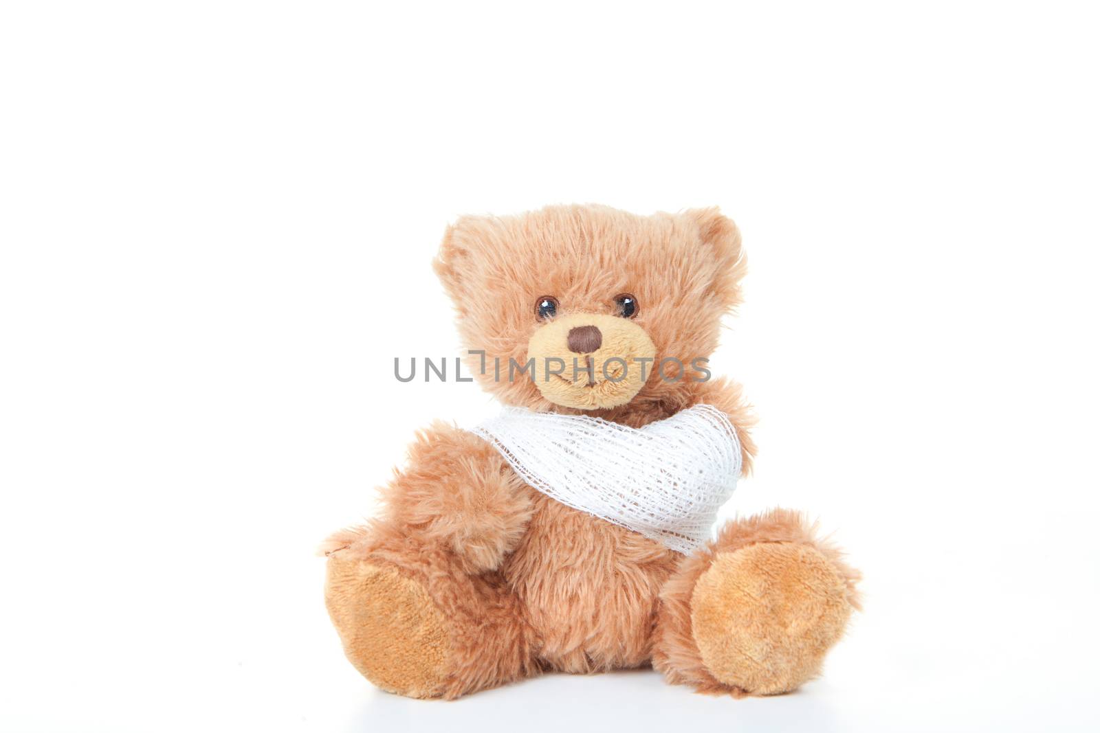 accident concept teddy with bandage