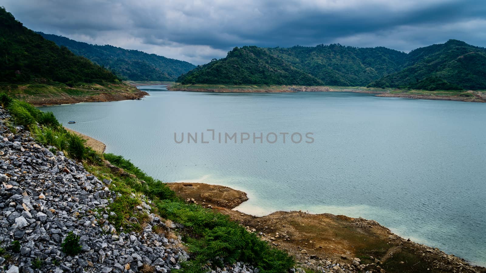 River and mountain backside of Khundanprakanchon dam, Nakhon Nay by jakgree