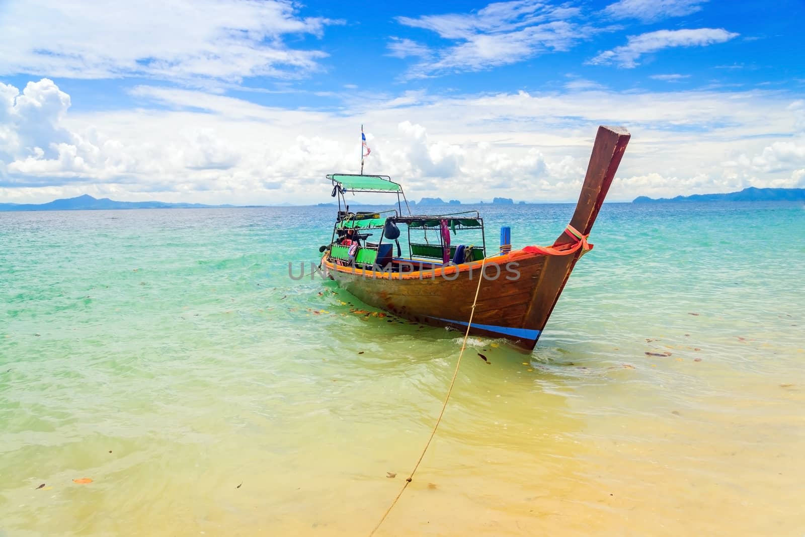 Long tailed boat at Kradan island, Thailand by jakgree