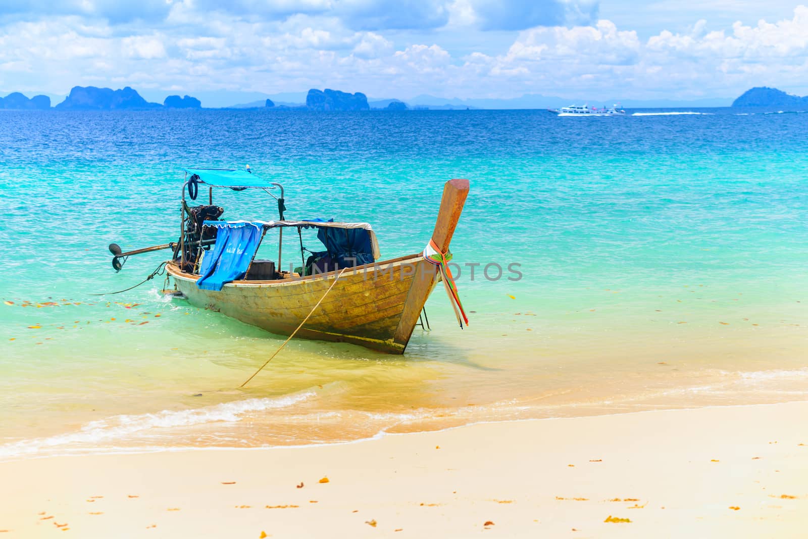 Long tailed boat at Kradan island, Thailand by jakgree