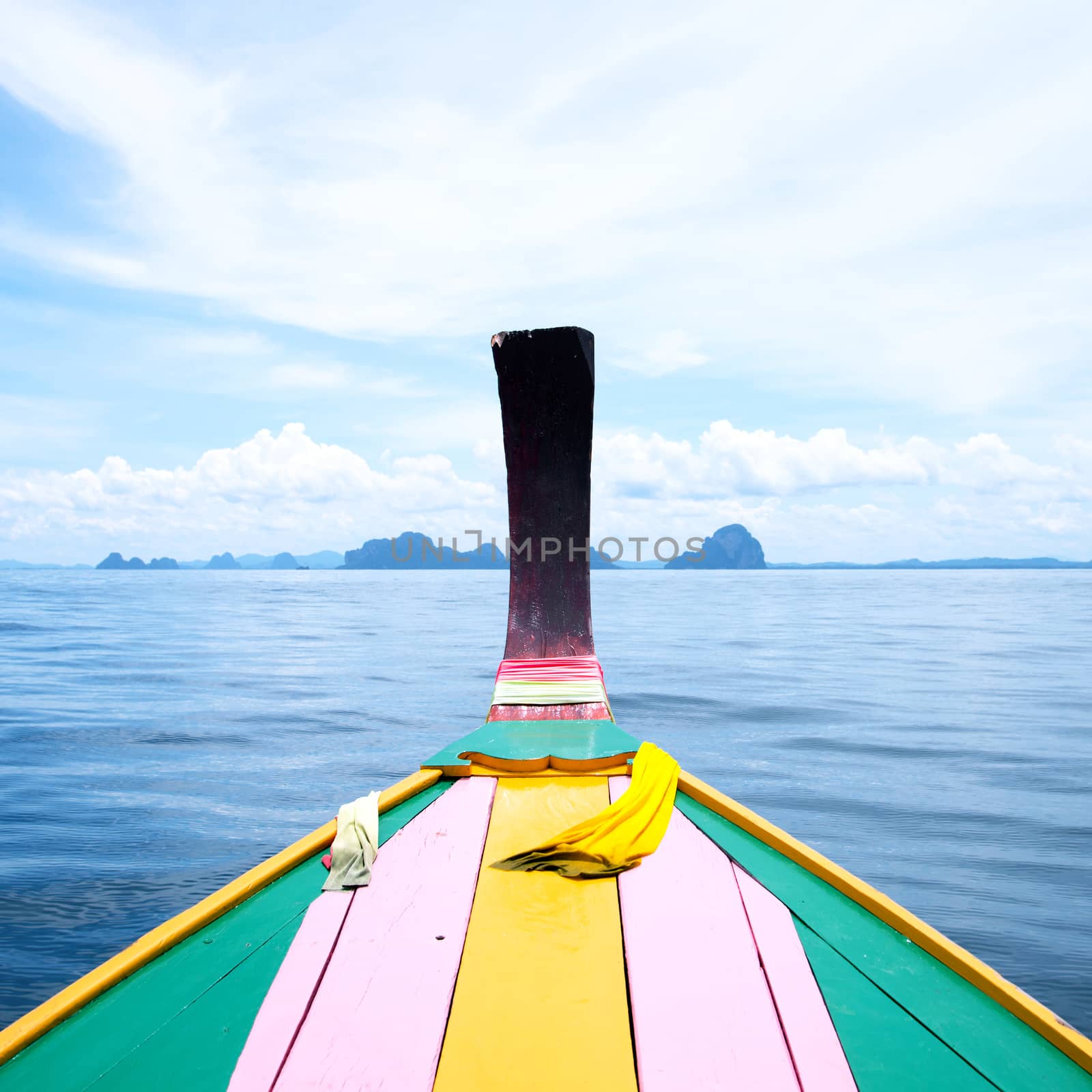 Head long tail fisherman boat in Andaman sea by jakgree