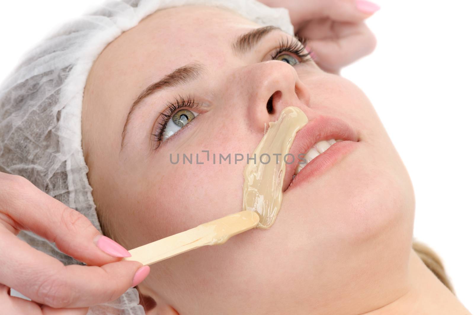 beauty salon, mustache depilation, facial skin treatment and care; focus on upper lip