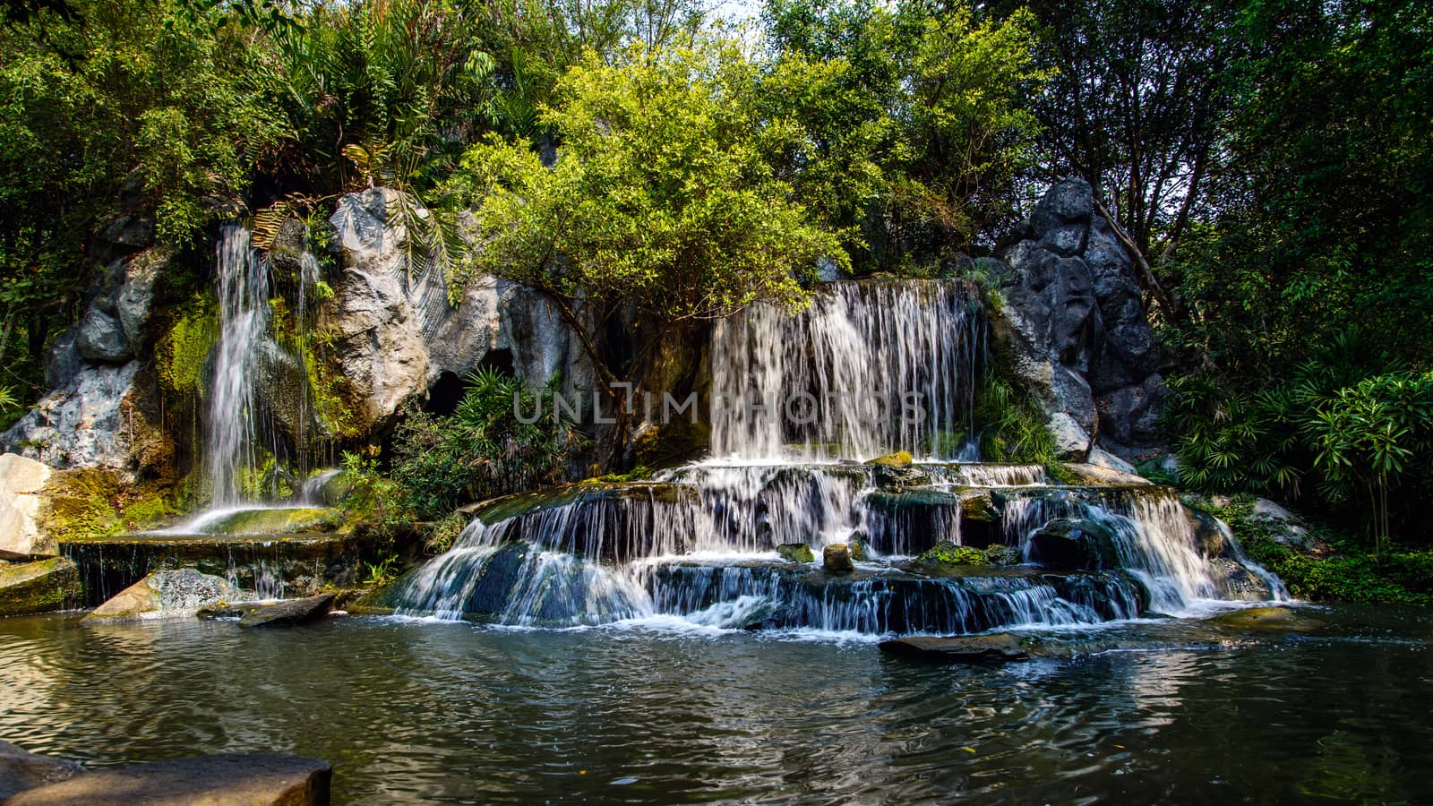 waterfall in forest by jakgree