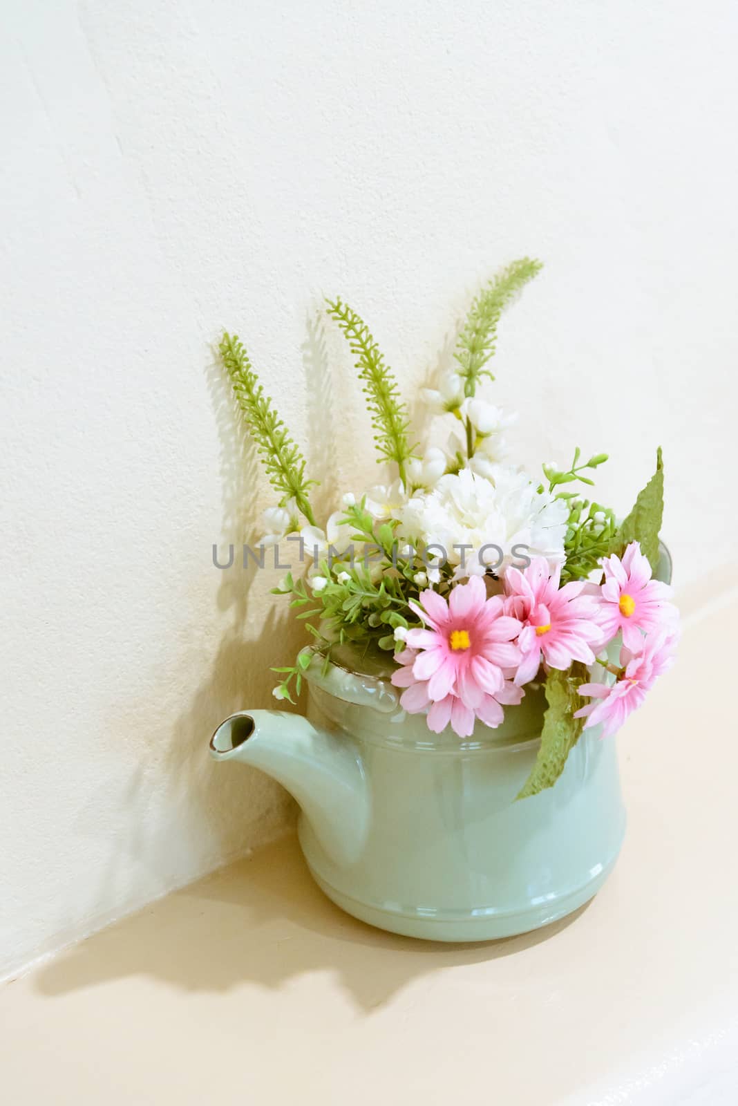 Vintage tone artificial flower on pot -  home interior by jakgree