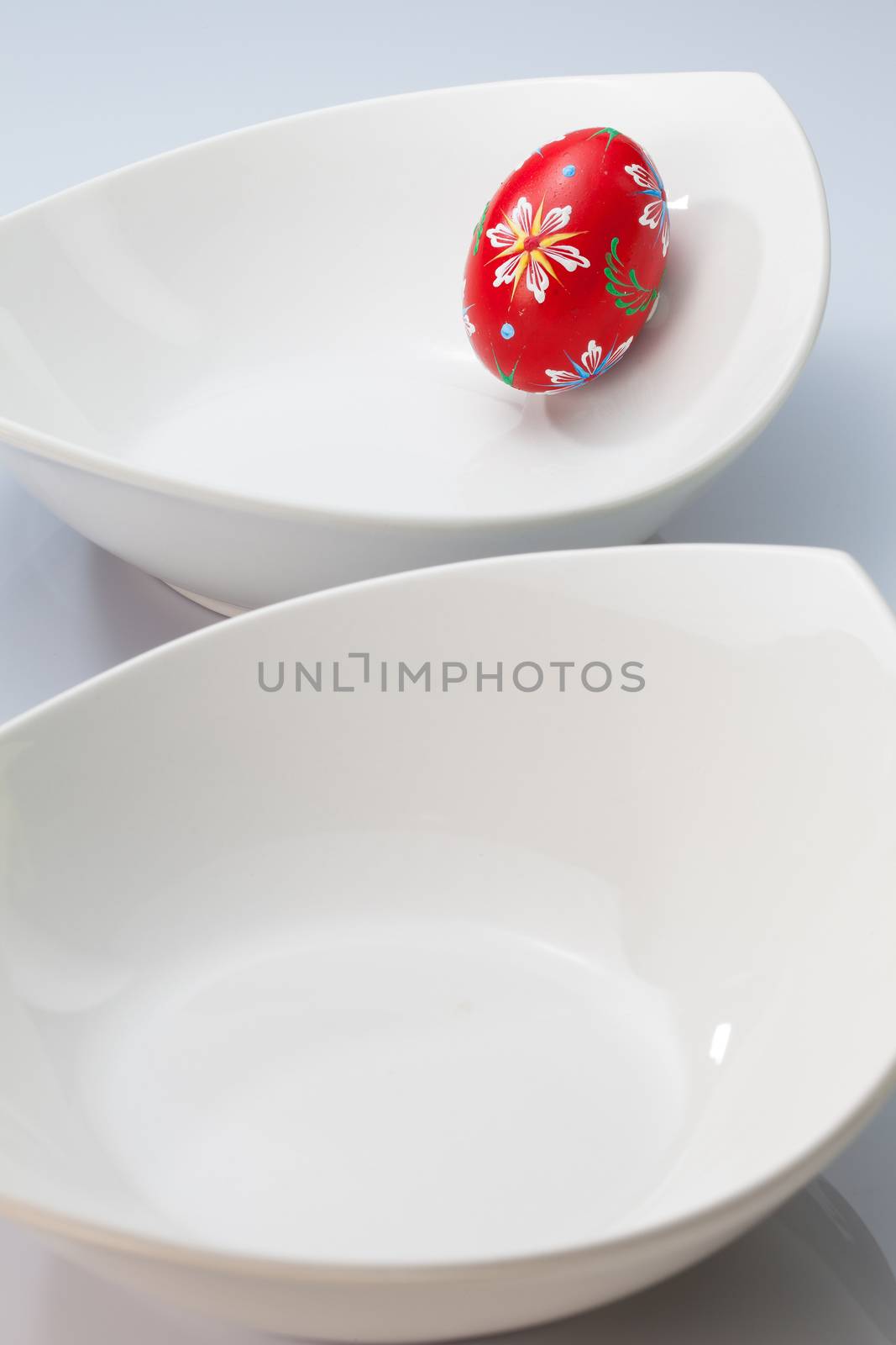 Two white bowls and easter egg by CaptureLight