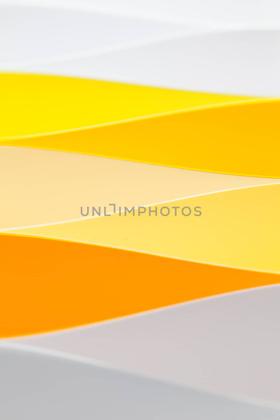 Abstract background image of pattern made by curved paper.