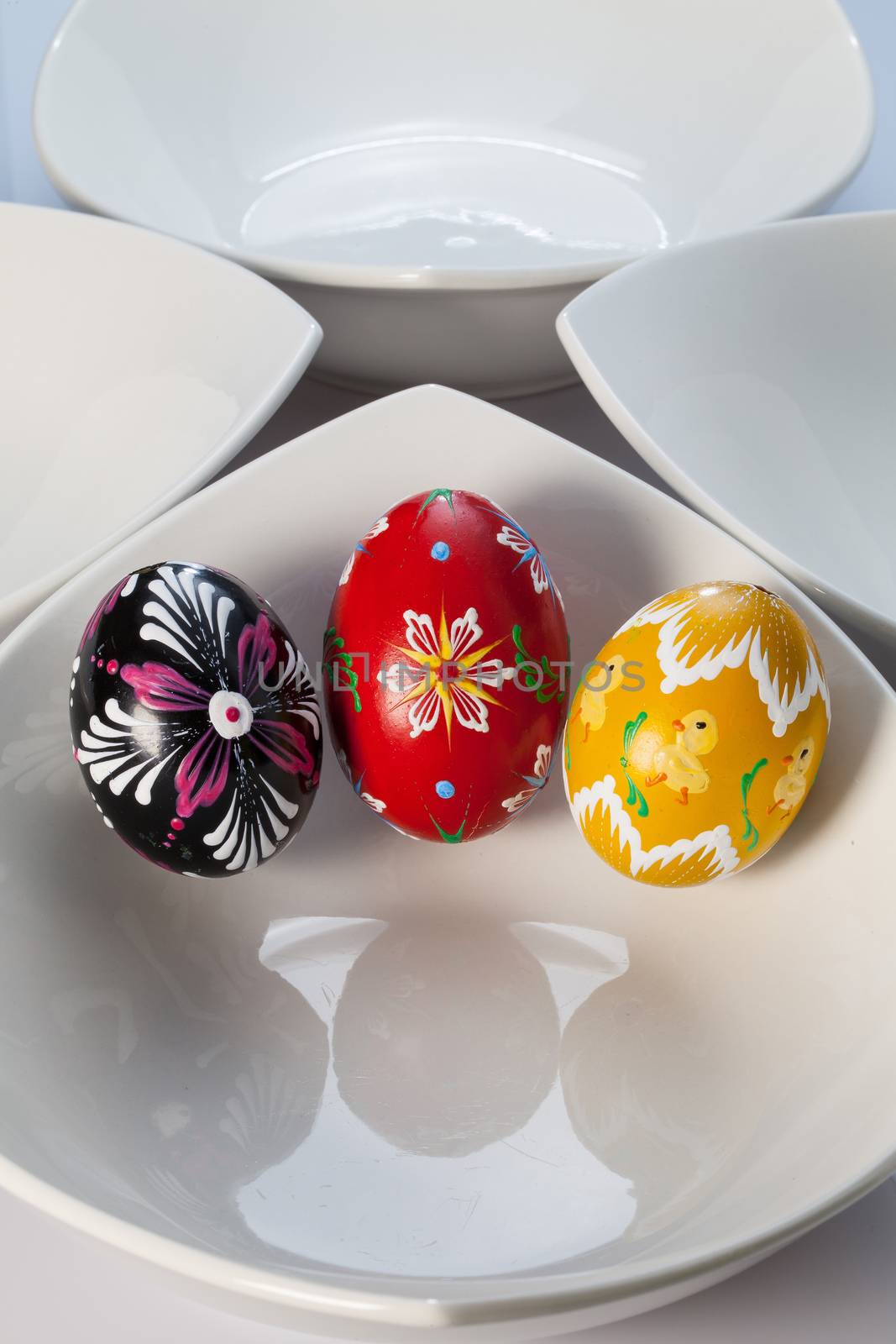White ceramics bowls and easter eggs by CaptureLight