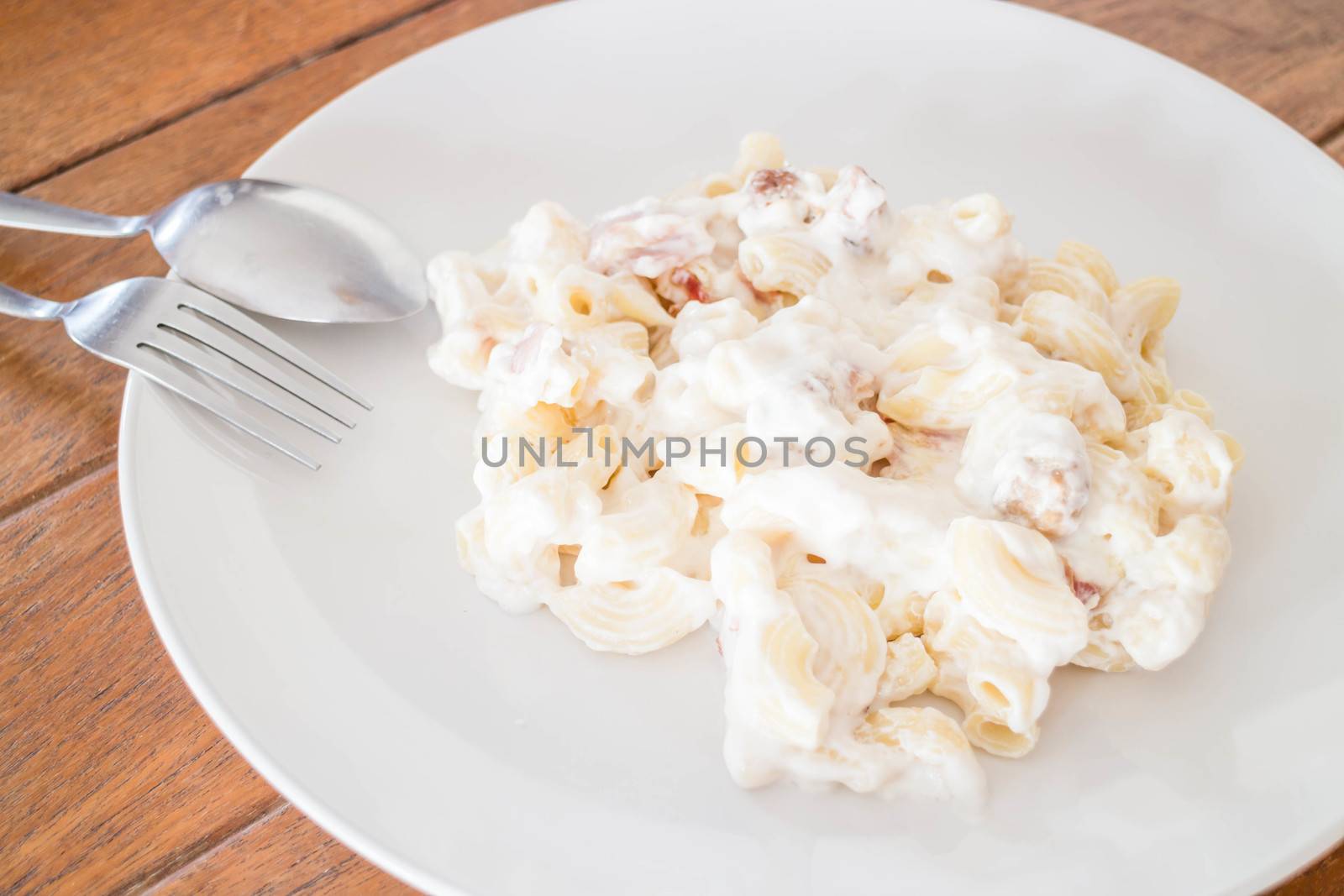 Closeup macaroni with pork ball and ham cheese  by punsayaporn