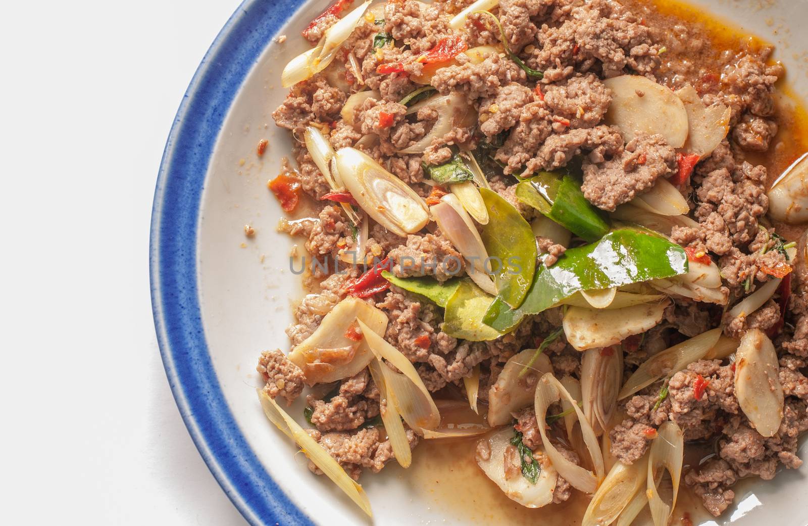 Basil beef stir fry on white background