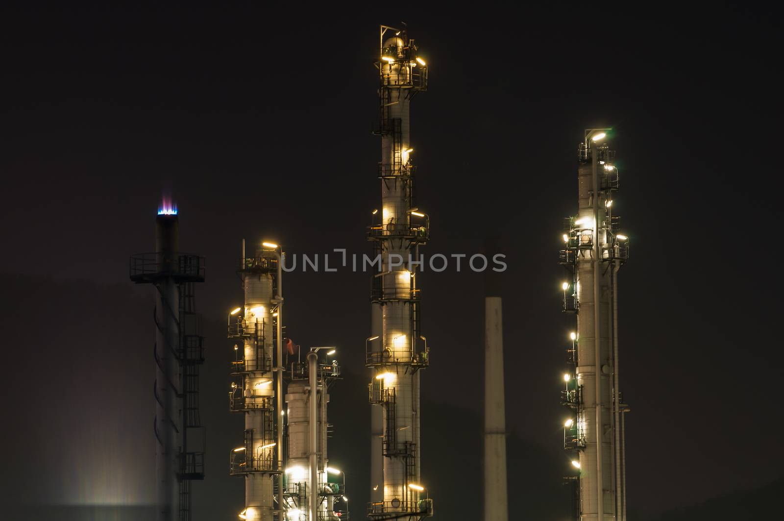 Oil refinery plant at dusk, power station