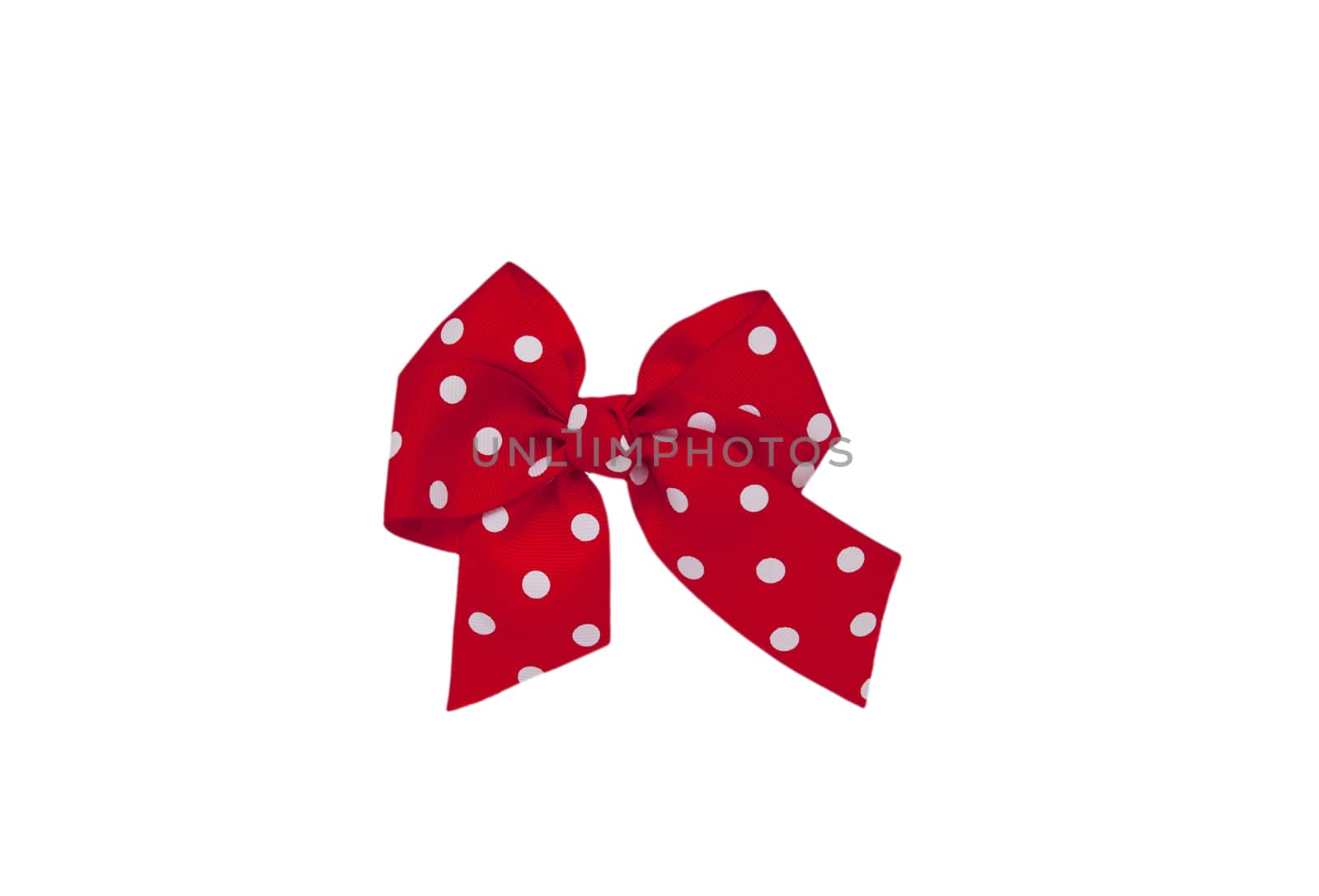 red bow made of ribbon isolated on white background  by cocoo