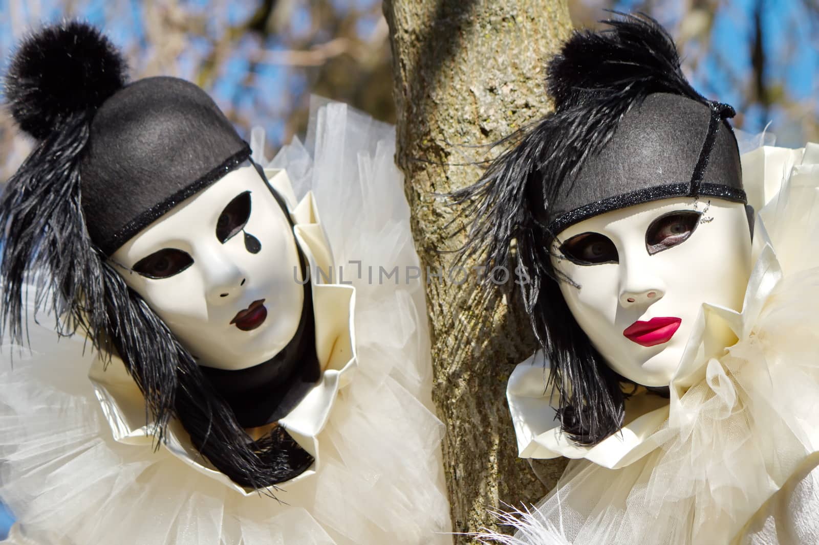 Black and white Pierrot couple at the 2014 Annecy venetian carnival, France