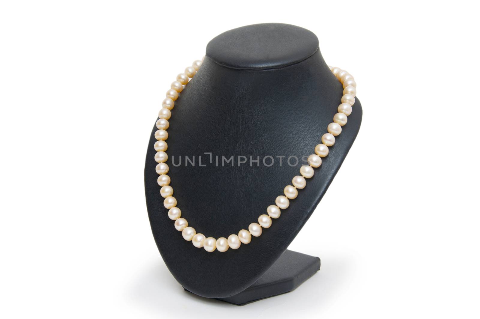 Pearl necklace on black mannequin isolated 