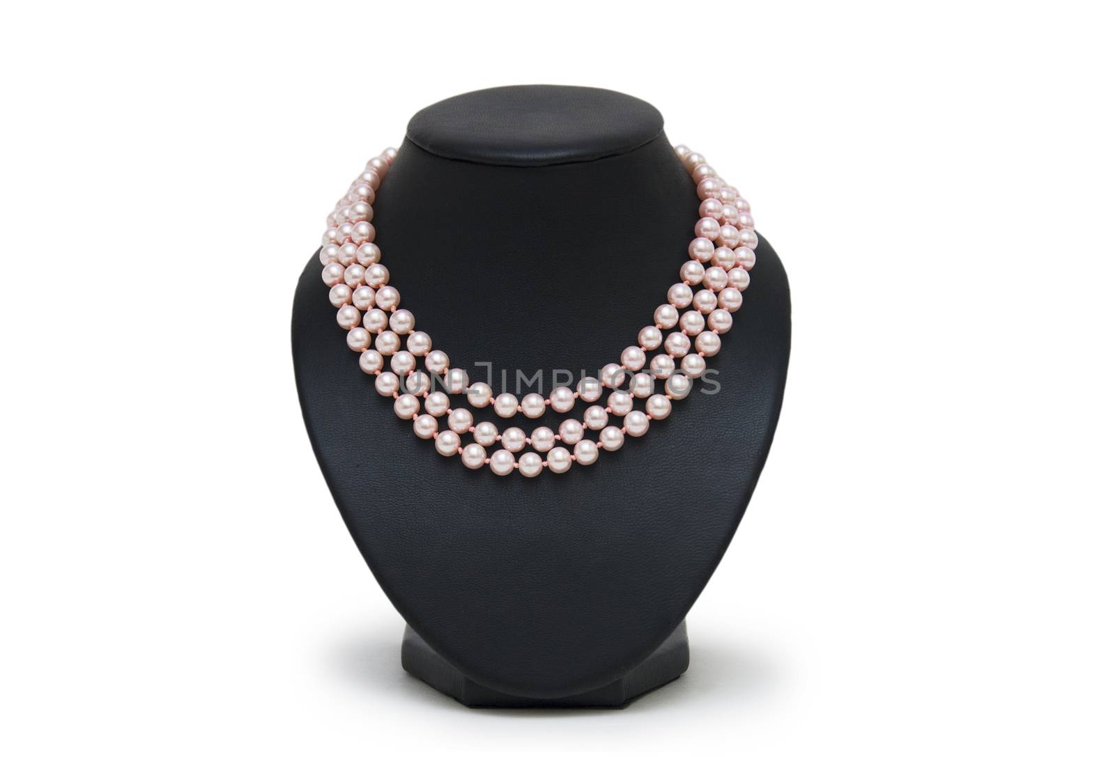 Pearl necklace on black mannequin isolated 