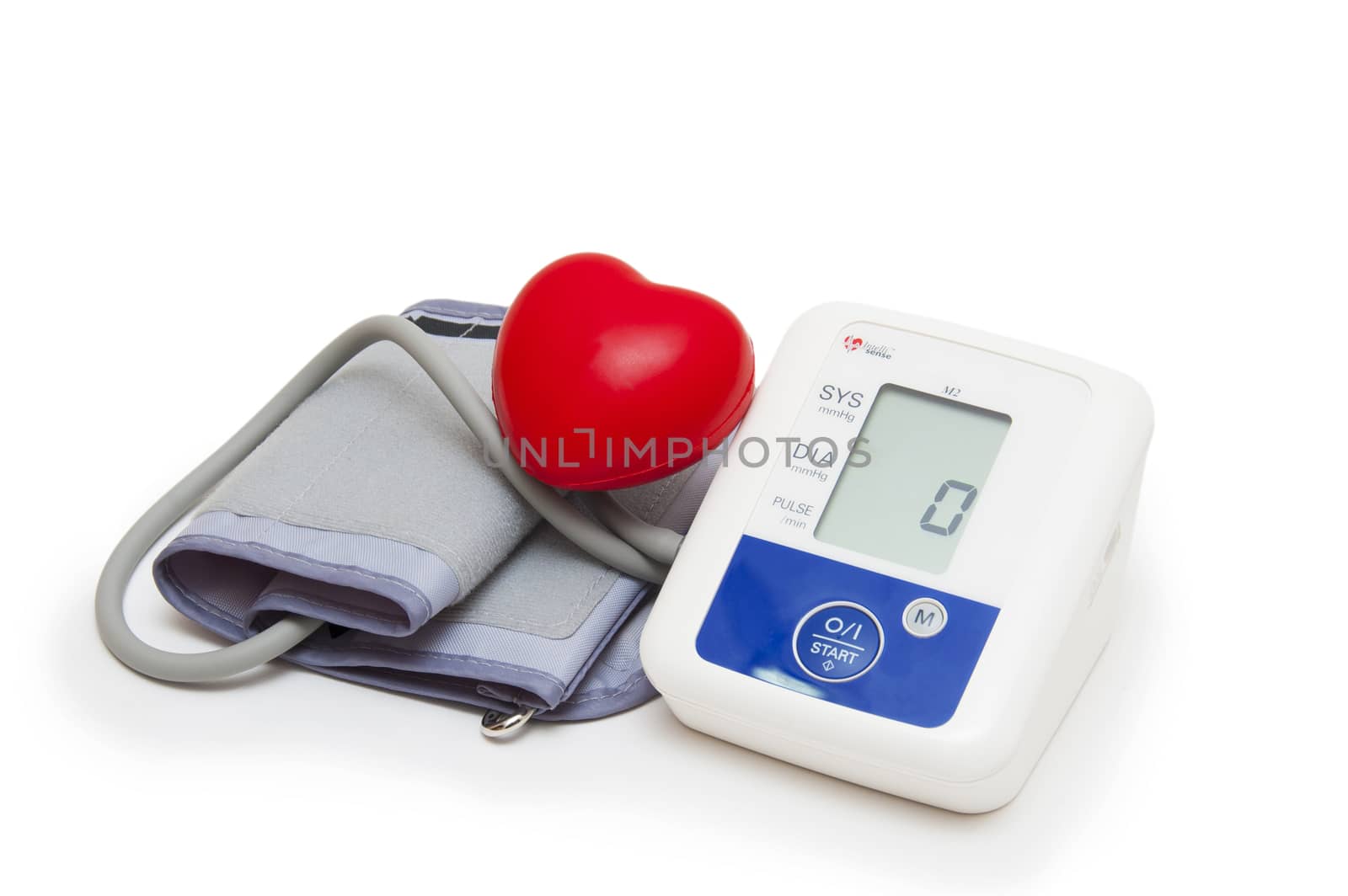 Digital blood pressure meter with love heart symbol on white background 