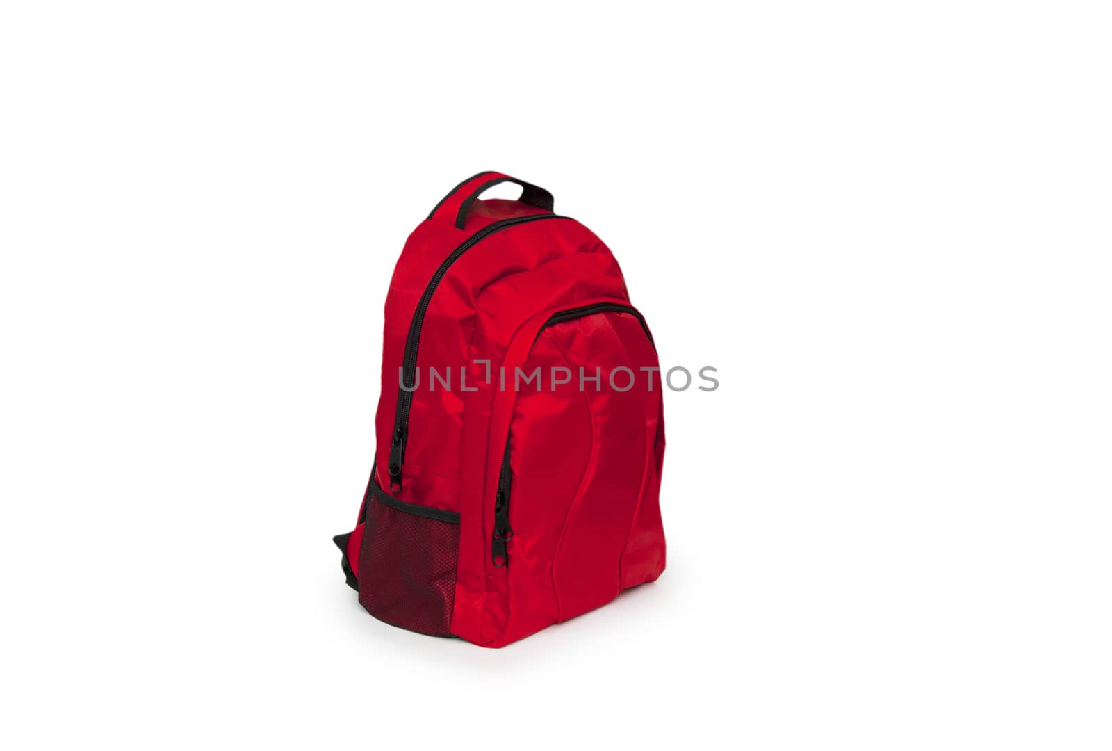 Red school backpack isolated on white by cocoo