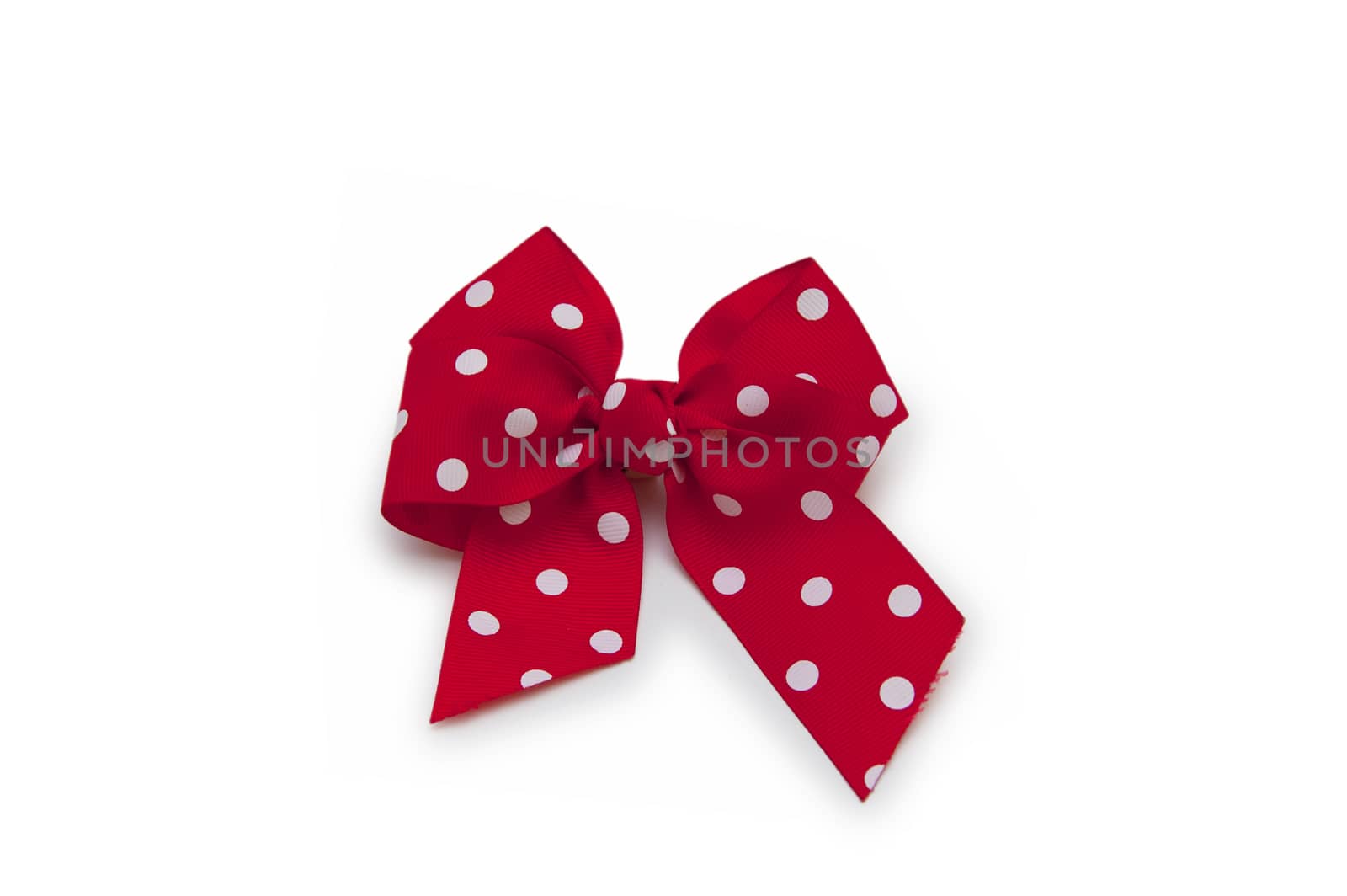 red bow made of ribbon isolated on white background by cocoo