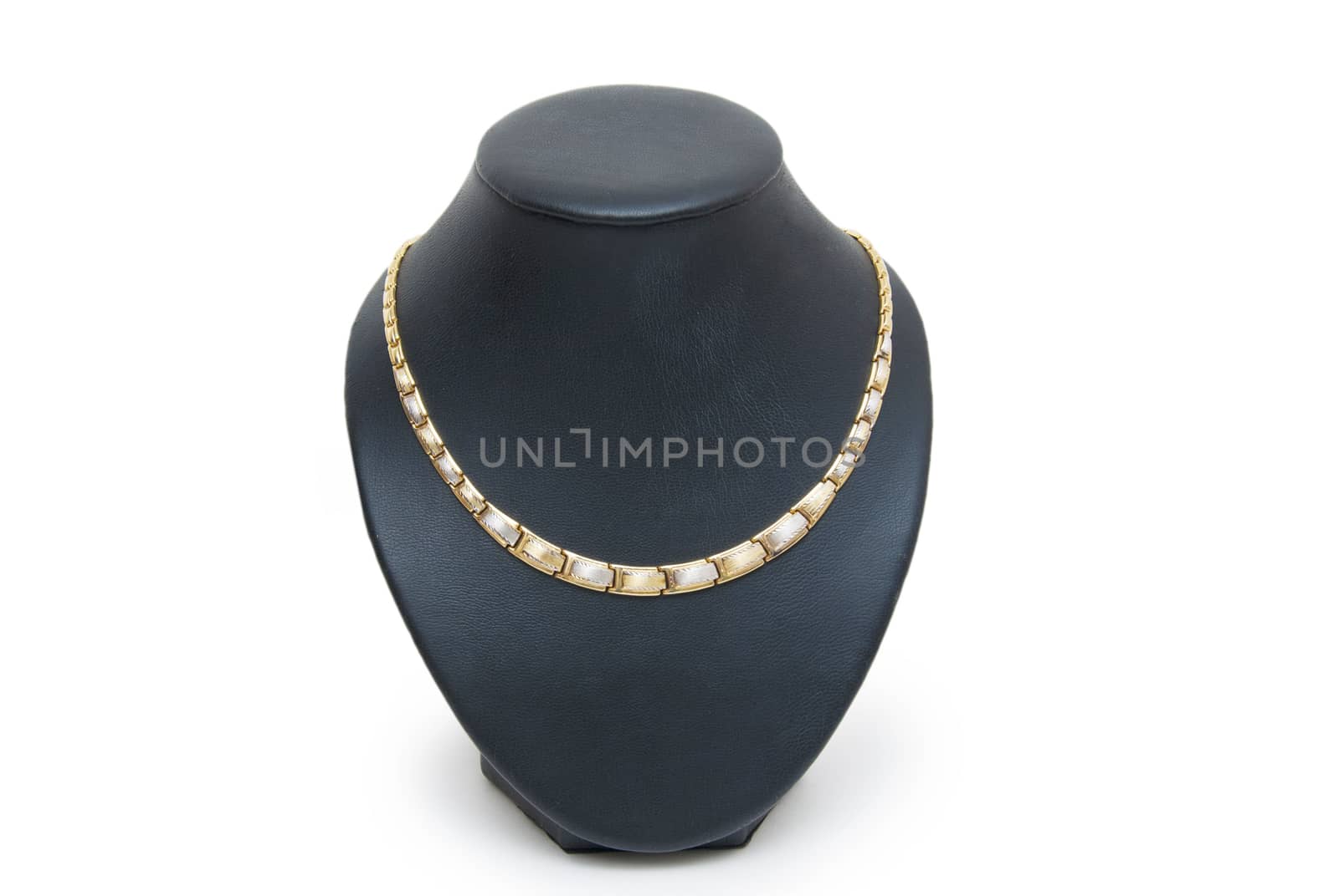 beautiful golden necklace on mannequin isolated on white  by cocoo