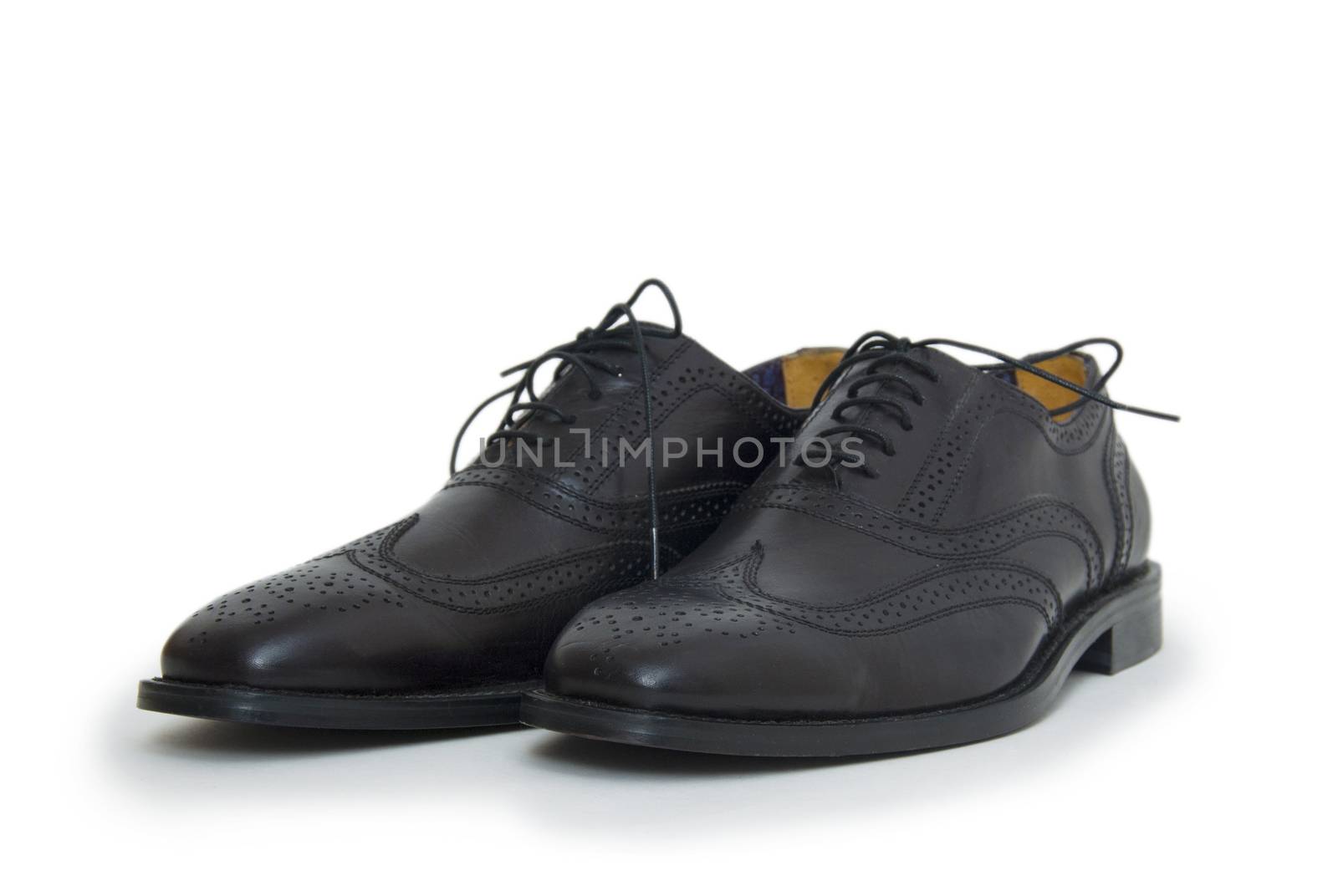 The black man's shoes isolated on white background.  by cocoo